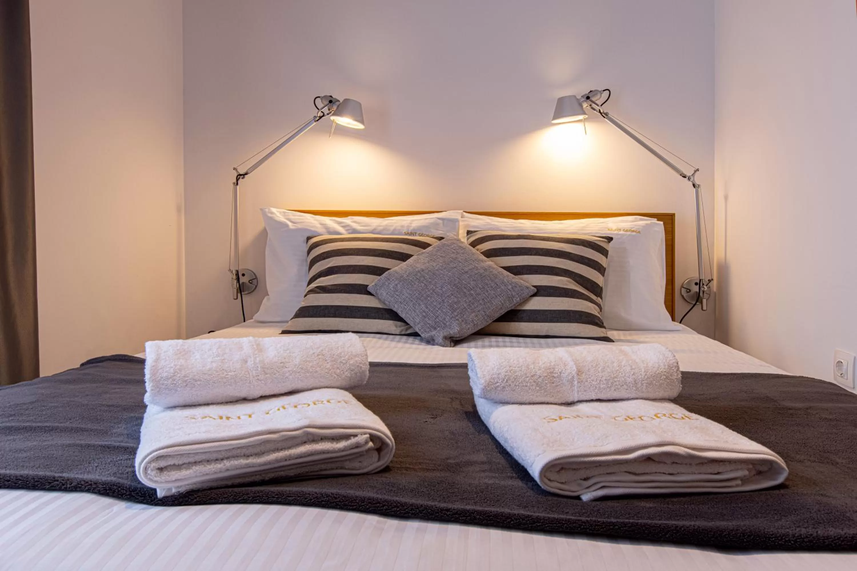 Bed in Saint George Boutique Rooms