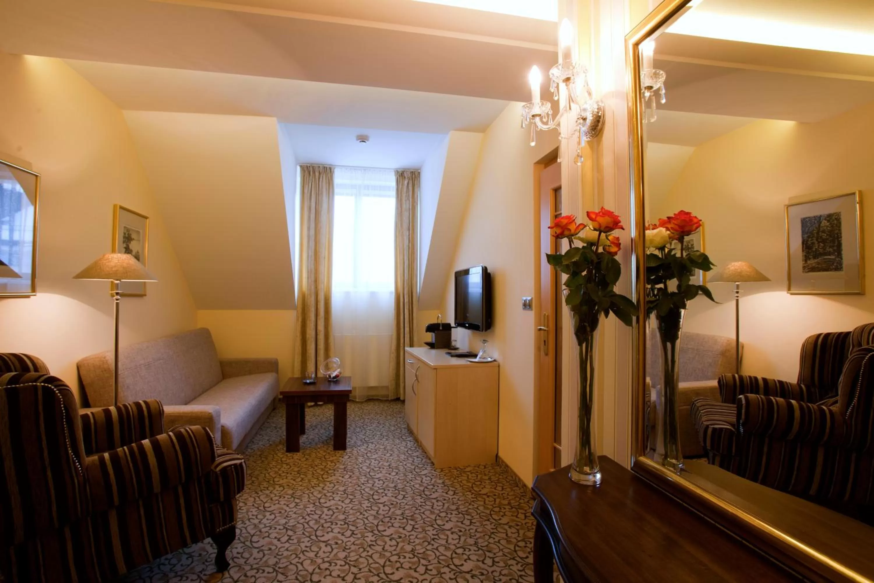 Seating area, Bed in Hotel Ambiente Wellness & Spa