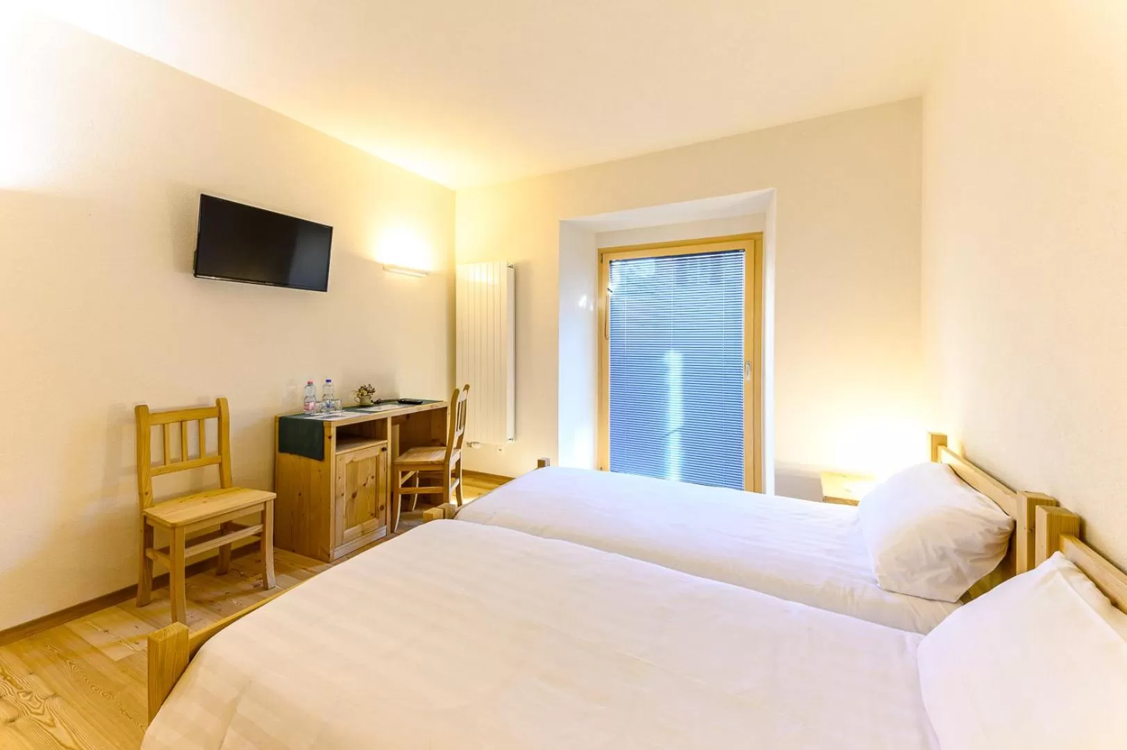 Bedroom, Bed in Hotel Centrale, Typically Swiss