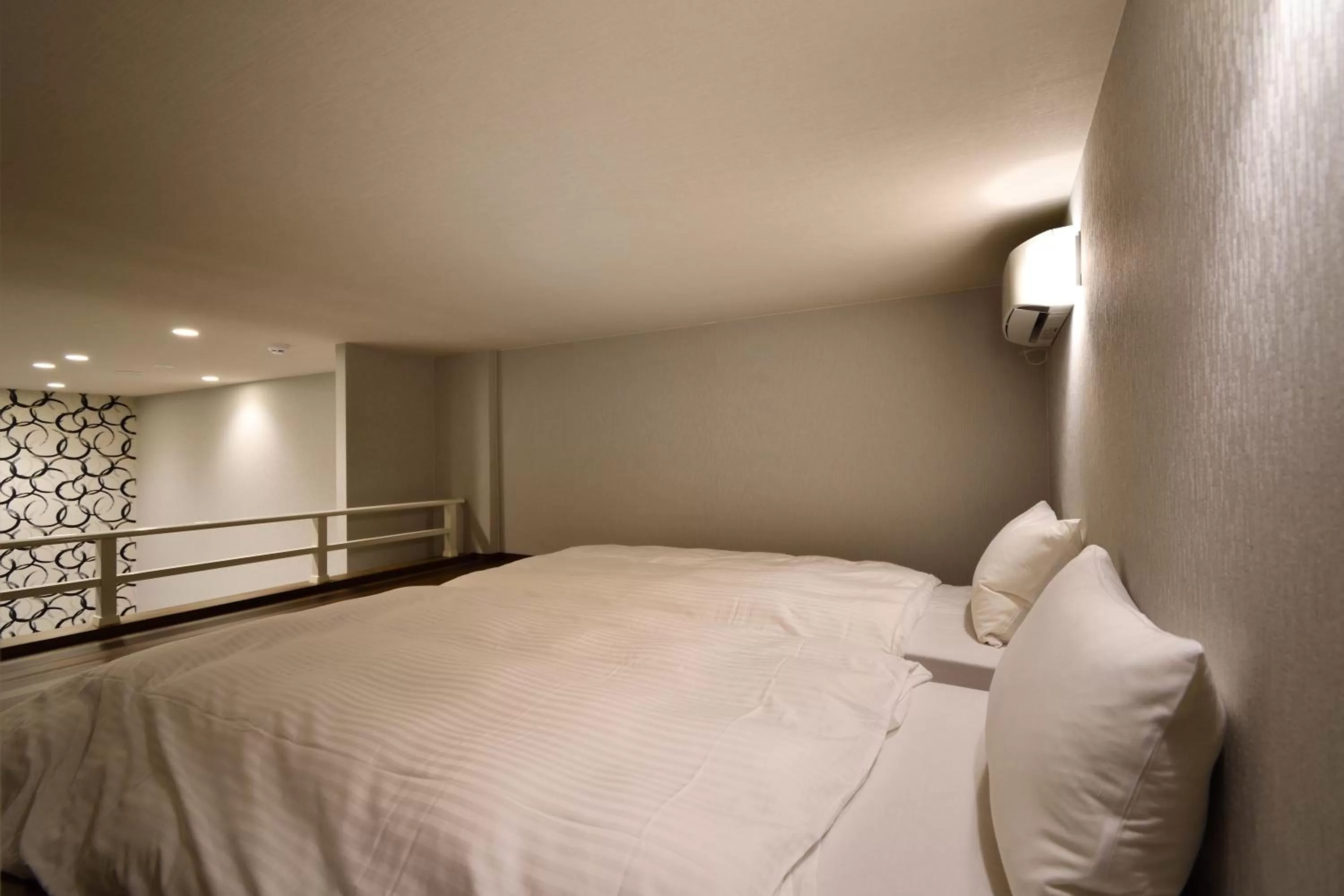 Bed in The BREAKFAST HOTEL Fukuoka Nakasu