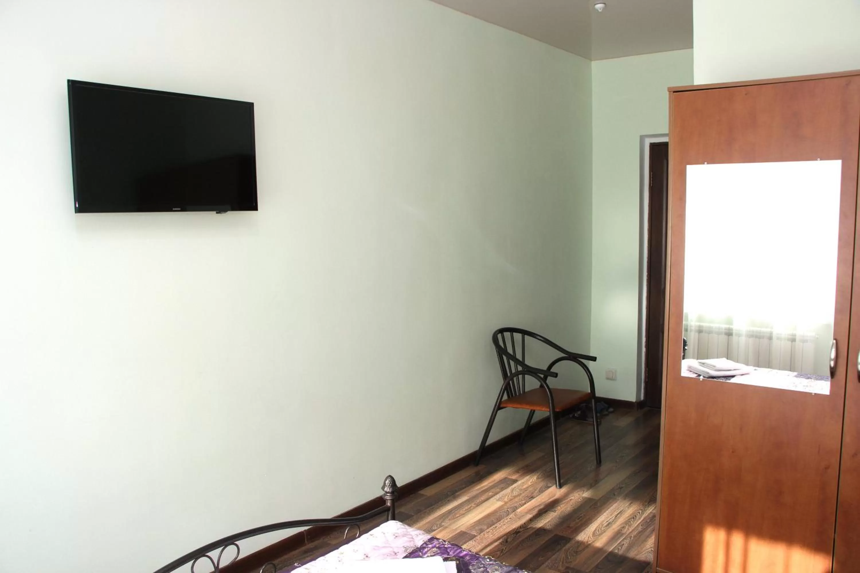 TV/Entertainment Center in Zhaylau Hotel