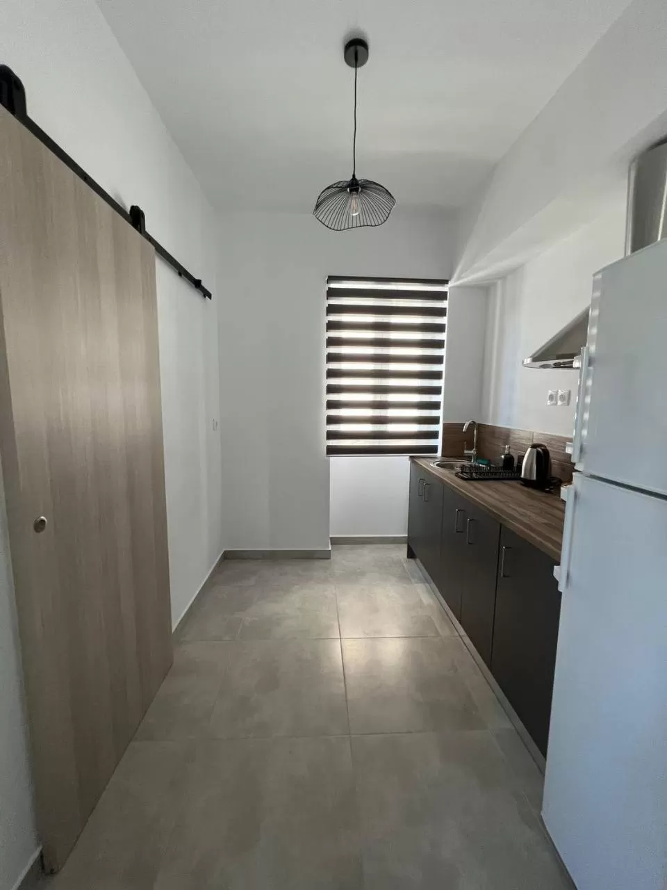 Kitchen or kitchenette in Elefsinian Mysteries Apartments