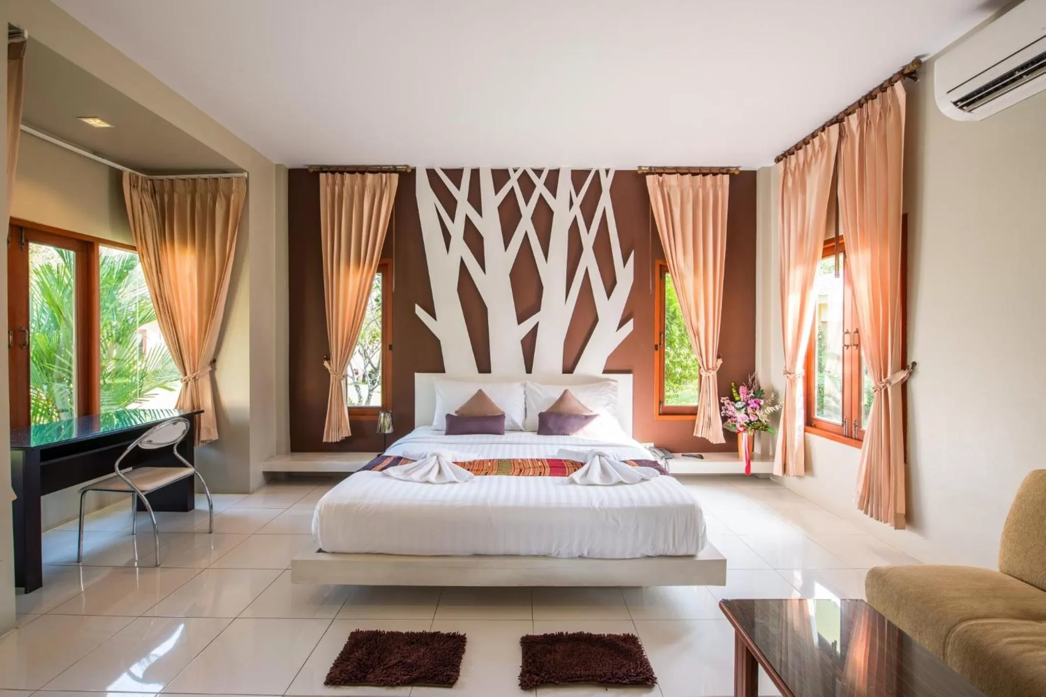 Bed in Panlaan Boutique Resort