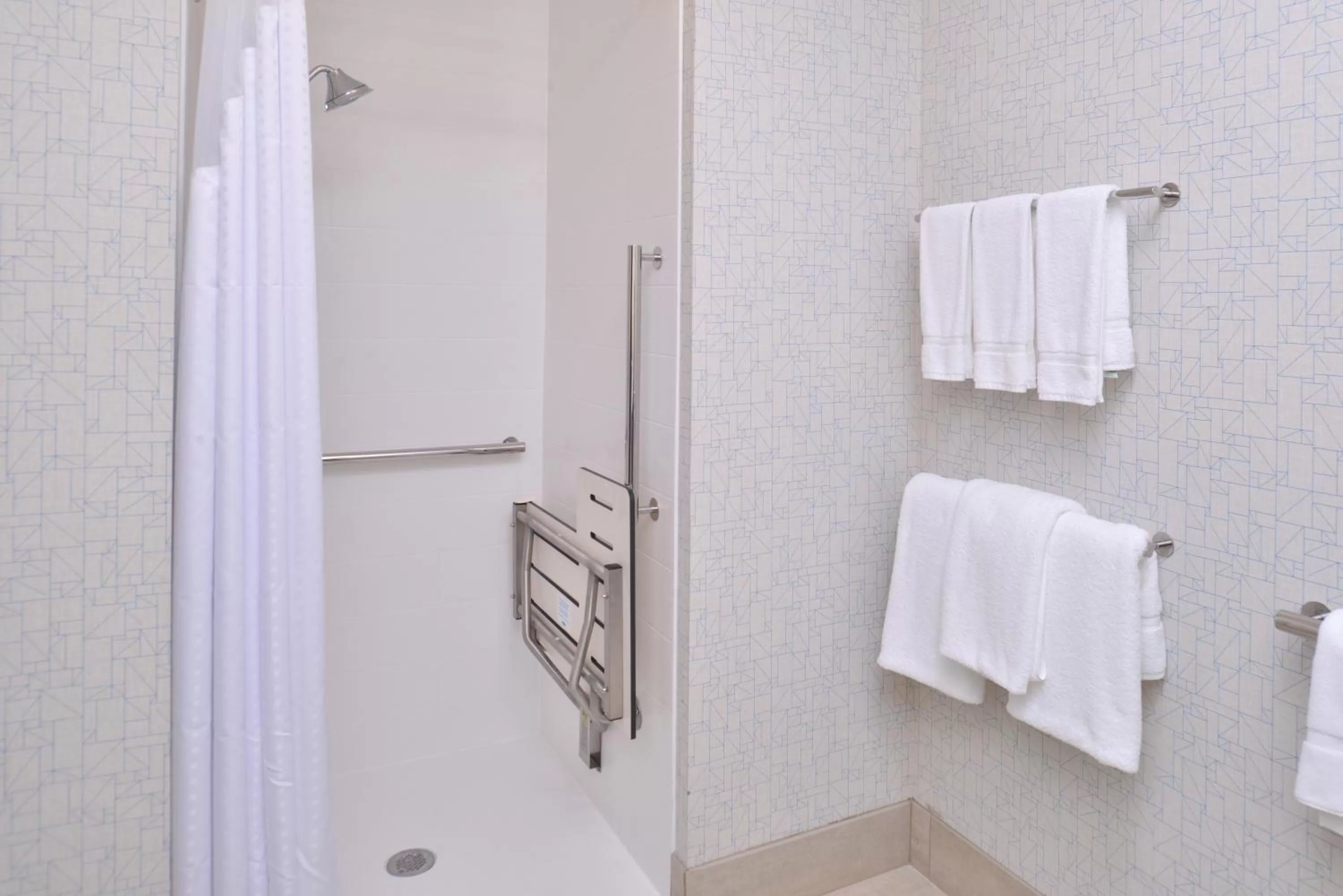 Bathroom in Holiday Inn Express & Suites Omaha Airport by IHG