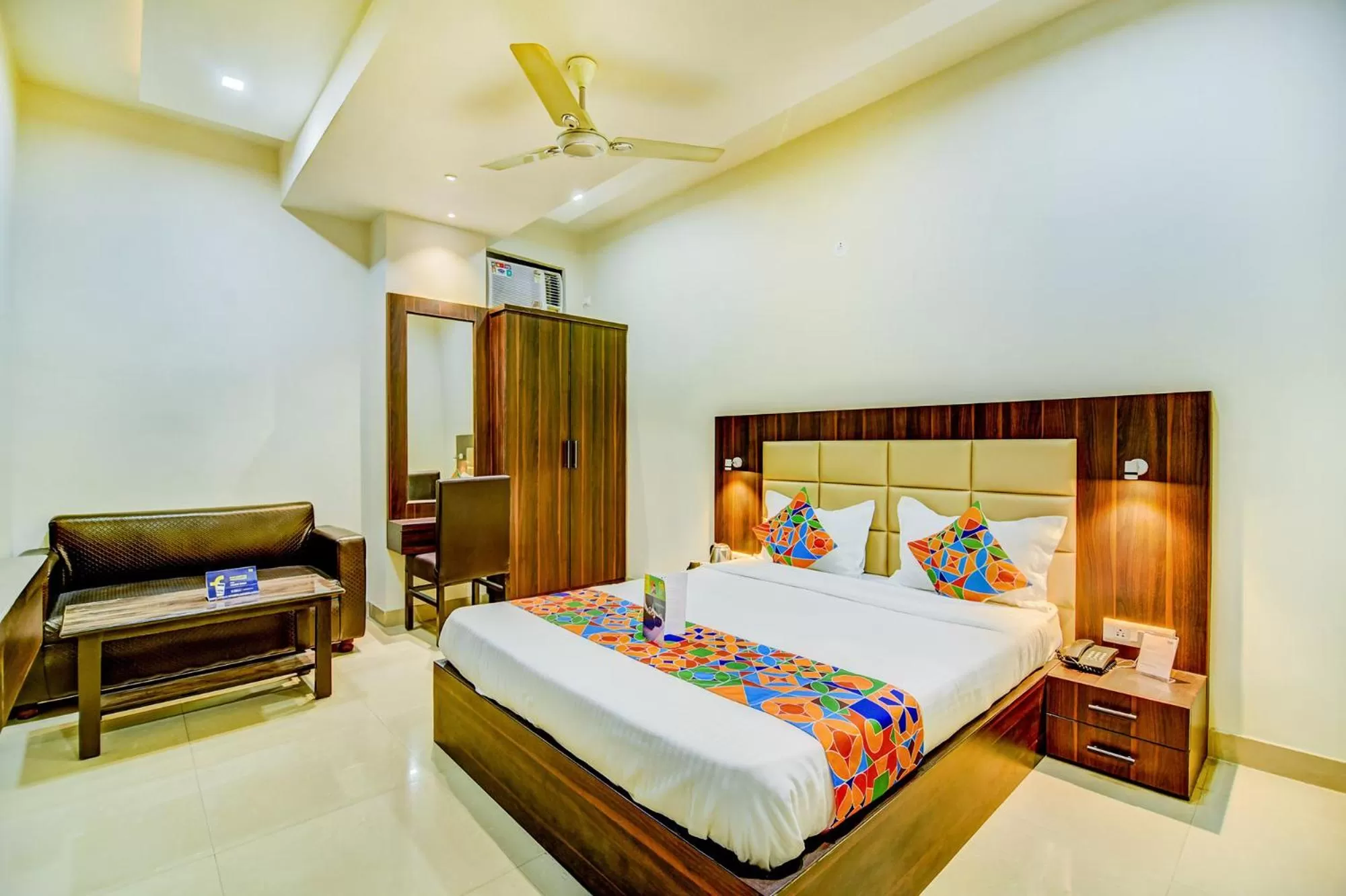 Bed in FabHotel Solitaire Inn Tilak Nagar