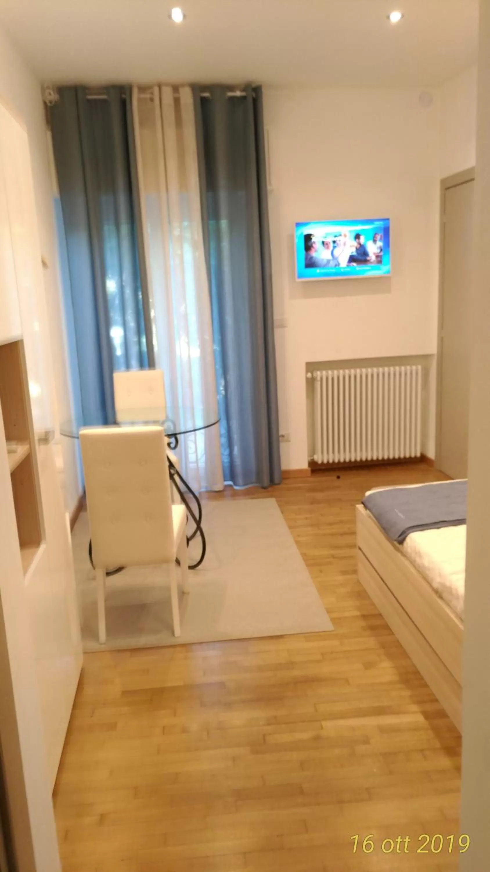 Bed, TV/Entertainment Center in "La Selvetta" bed and breakfast