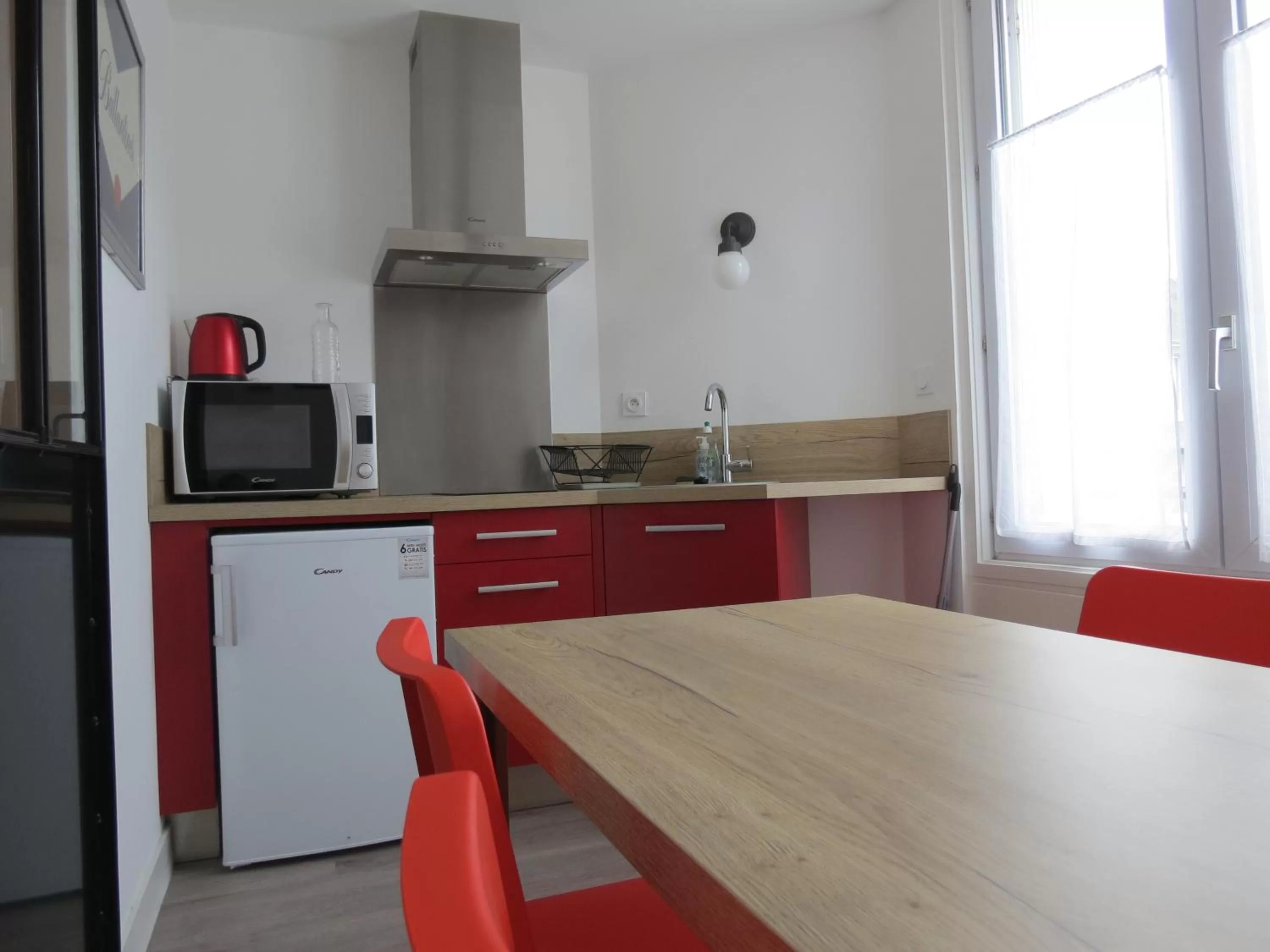 Kitchen or kitchenette in Hotel le Faisan