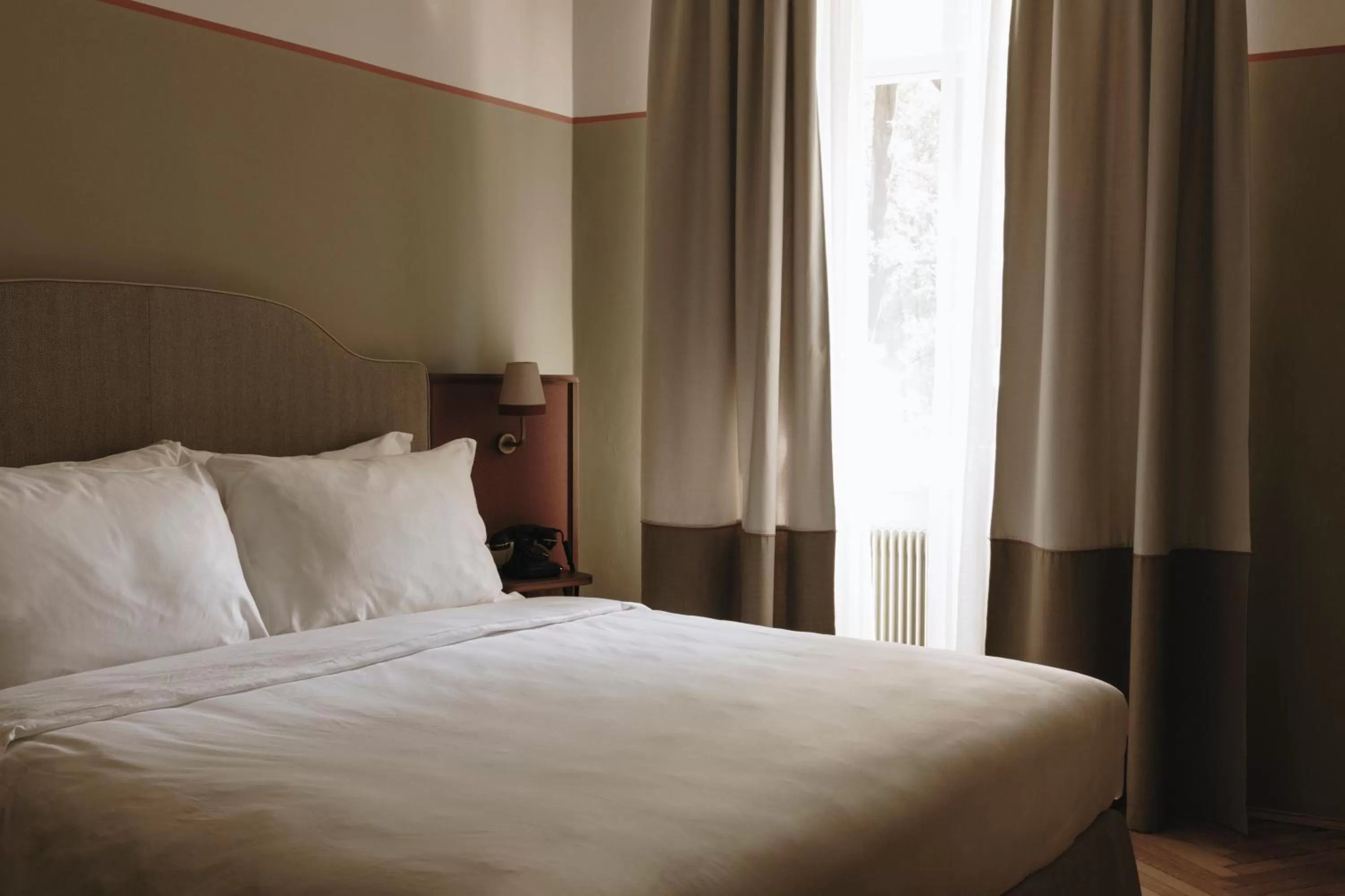 Bedroom, Bed in Parkhotel Mondschein, a Member of Design Hotels