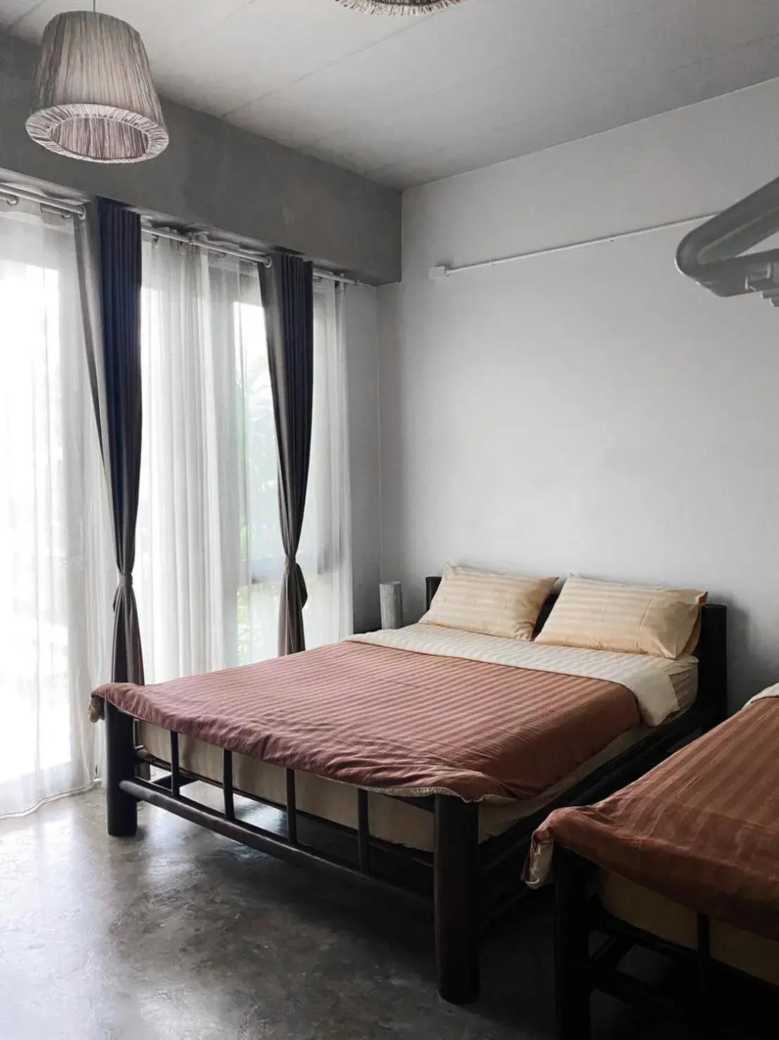 Deluxe Triple Room - Pool Side in Lamphu House Chiang Mai Deluxe Triple Room - Pool Side in Lamphu House Chiang Mai