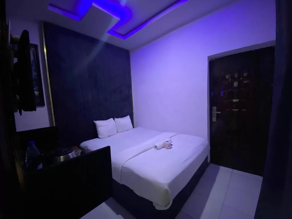 Bed in Palazzo Apartments