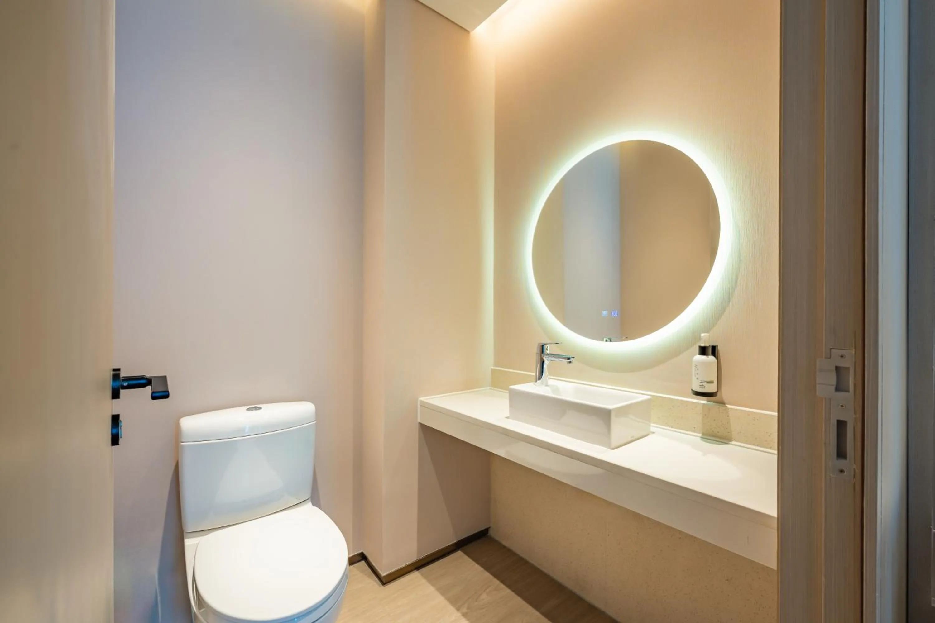 Toilet in EVEN Hotels Shanghai Expo by IHG