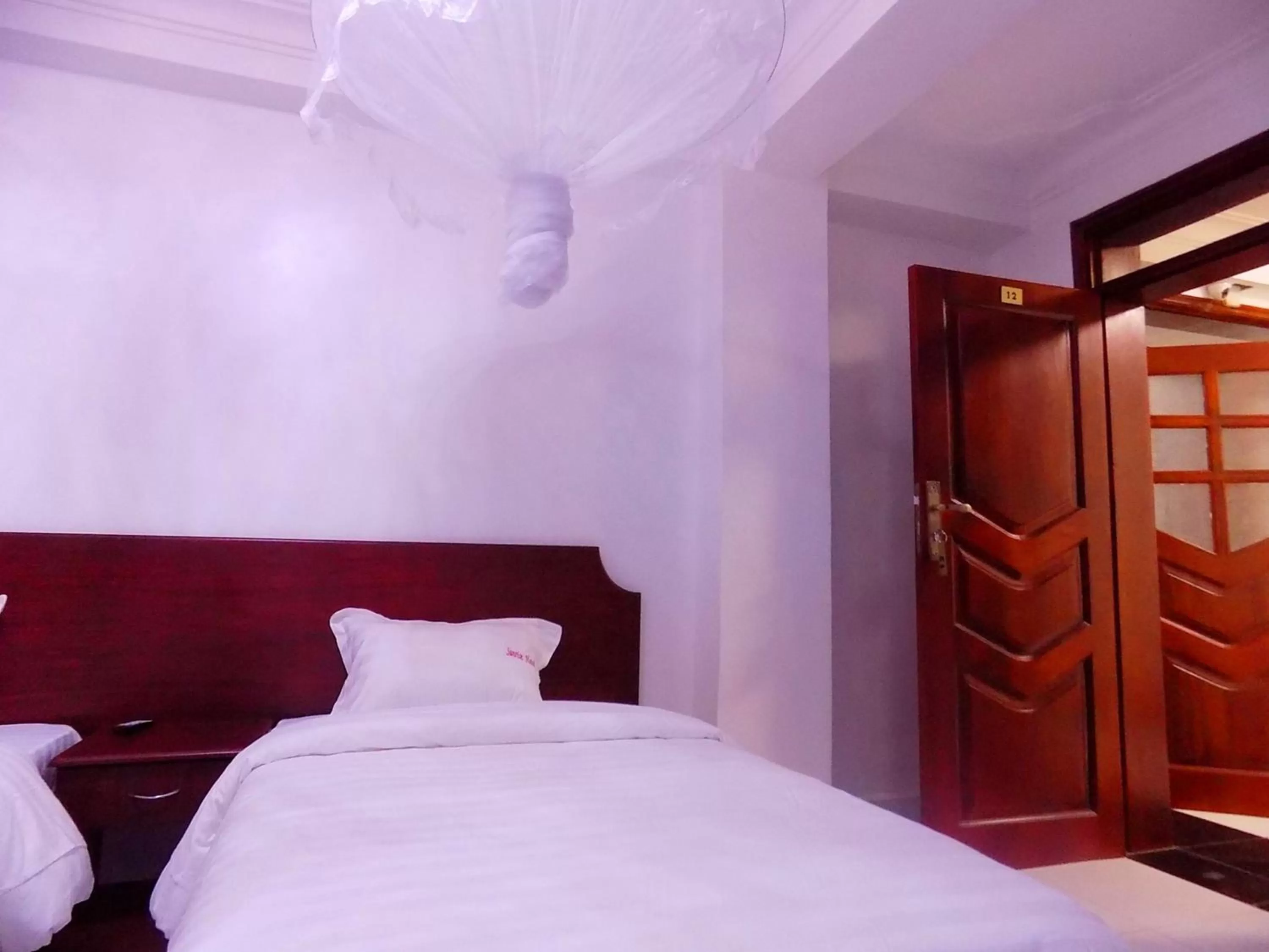 Bed in Sunrise Hotel Kampala