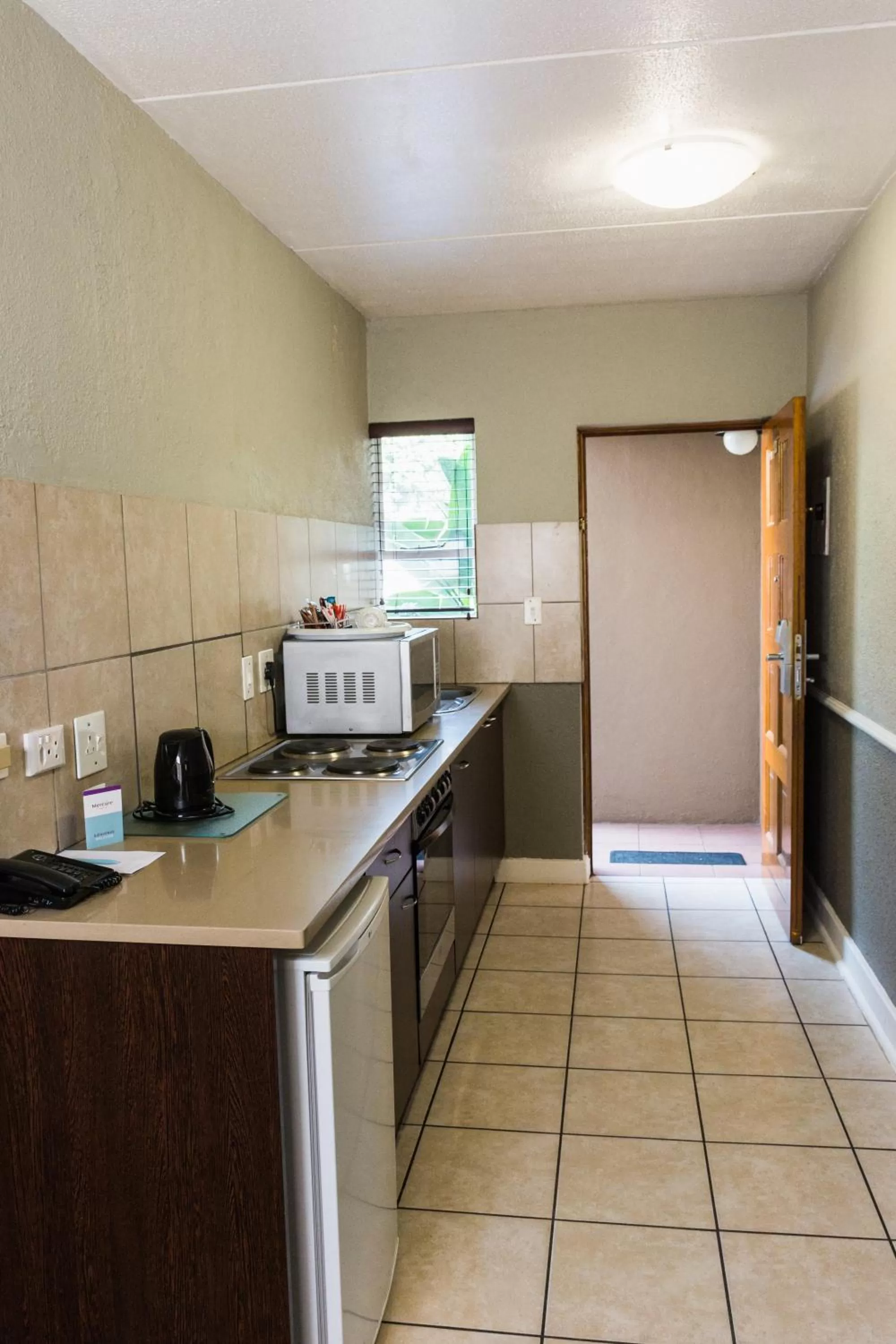 Kitchen or kitchenette in Mercure Hotel Nelspruit