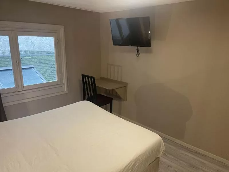 Bed in Hotel de la Gare