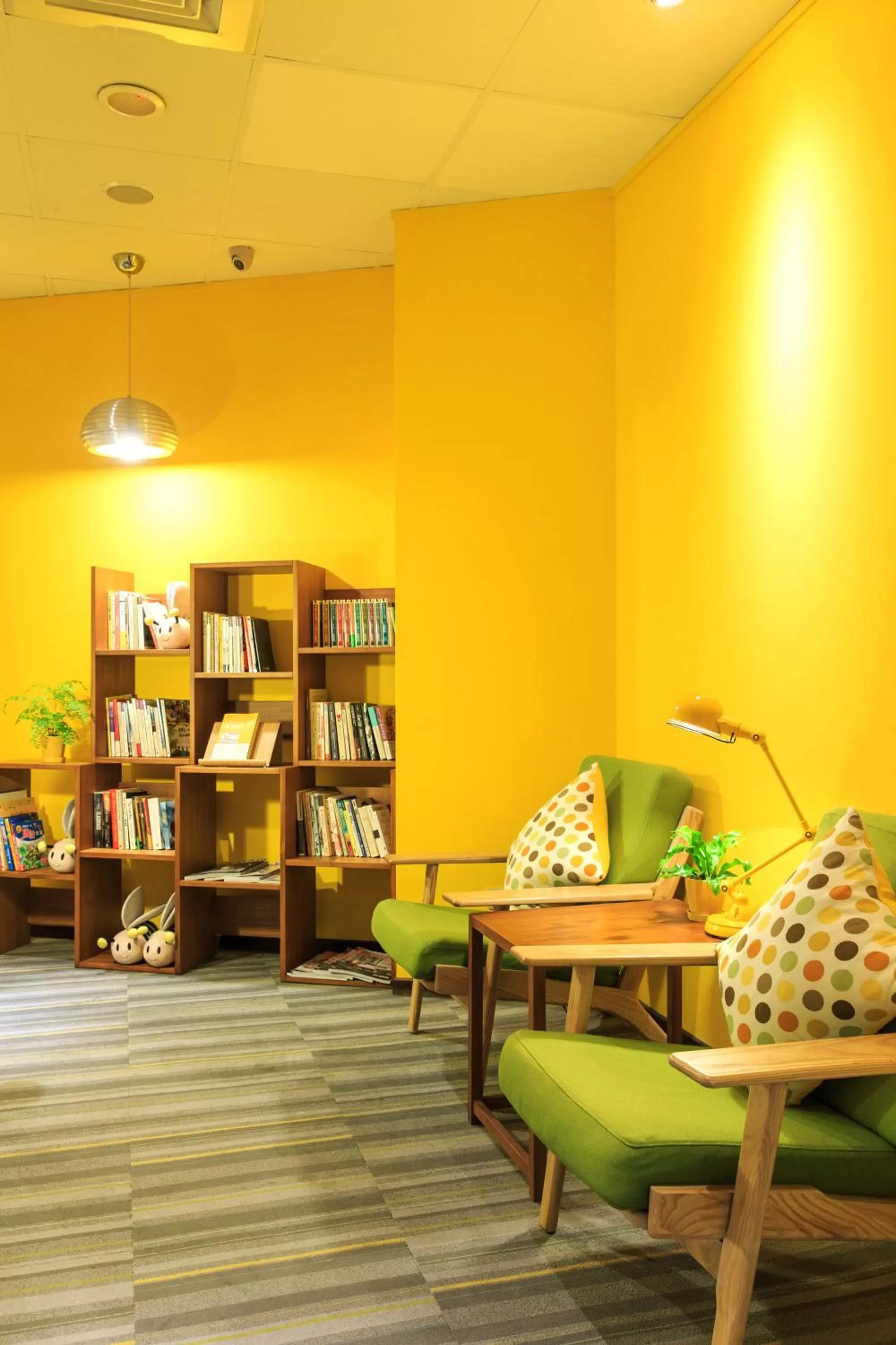 Library in Bee House by Cosmos Creation - Taipei Main Station