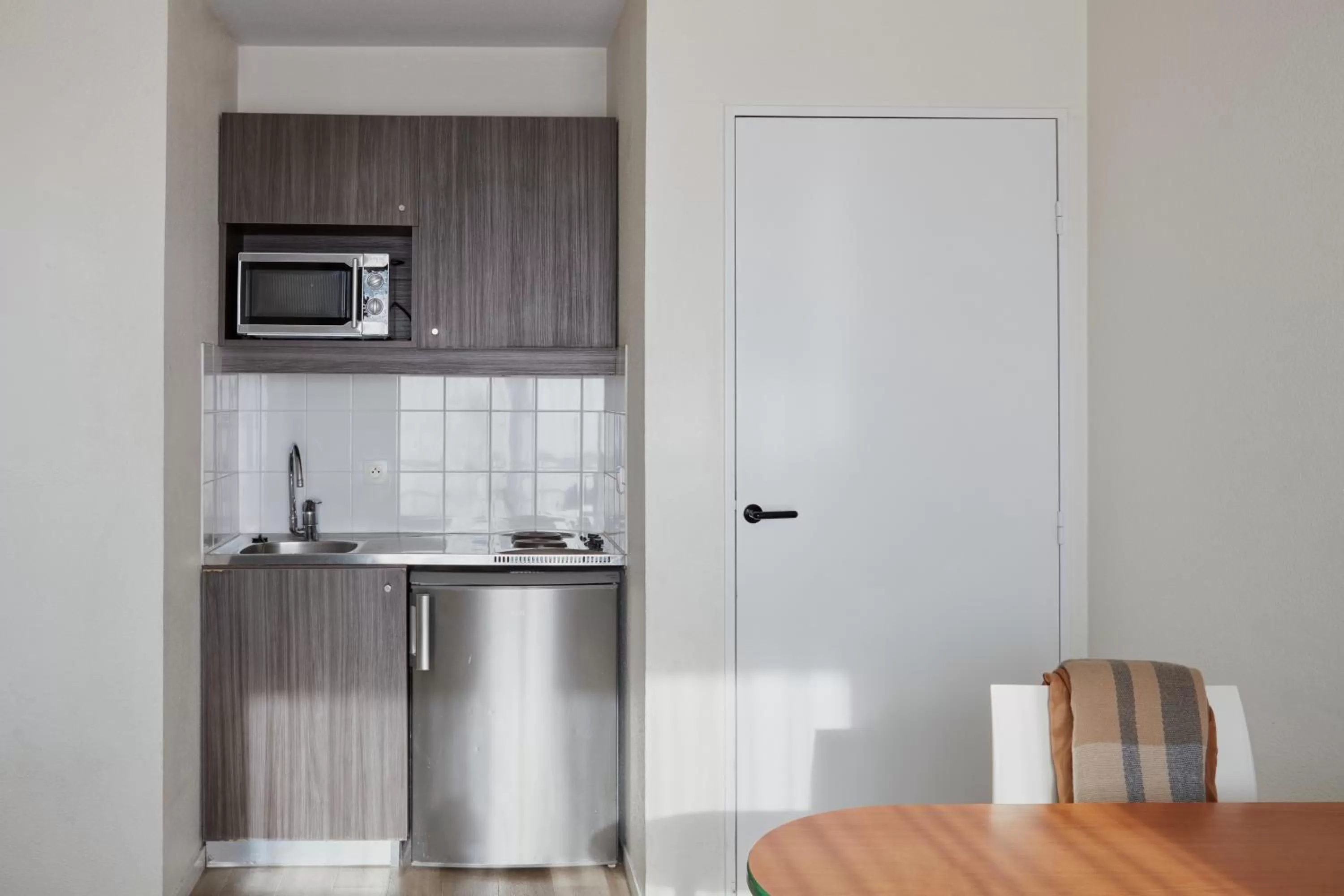 kitchen in Aparthotel Adagio Access Bordeaux Rodesse
