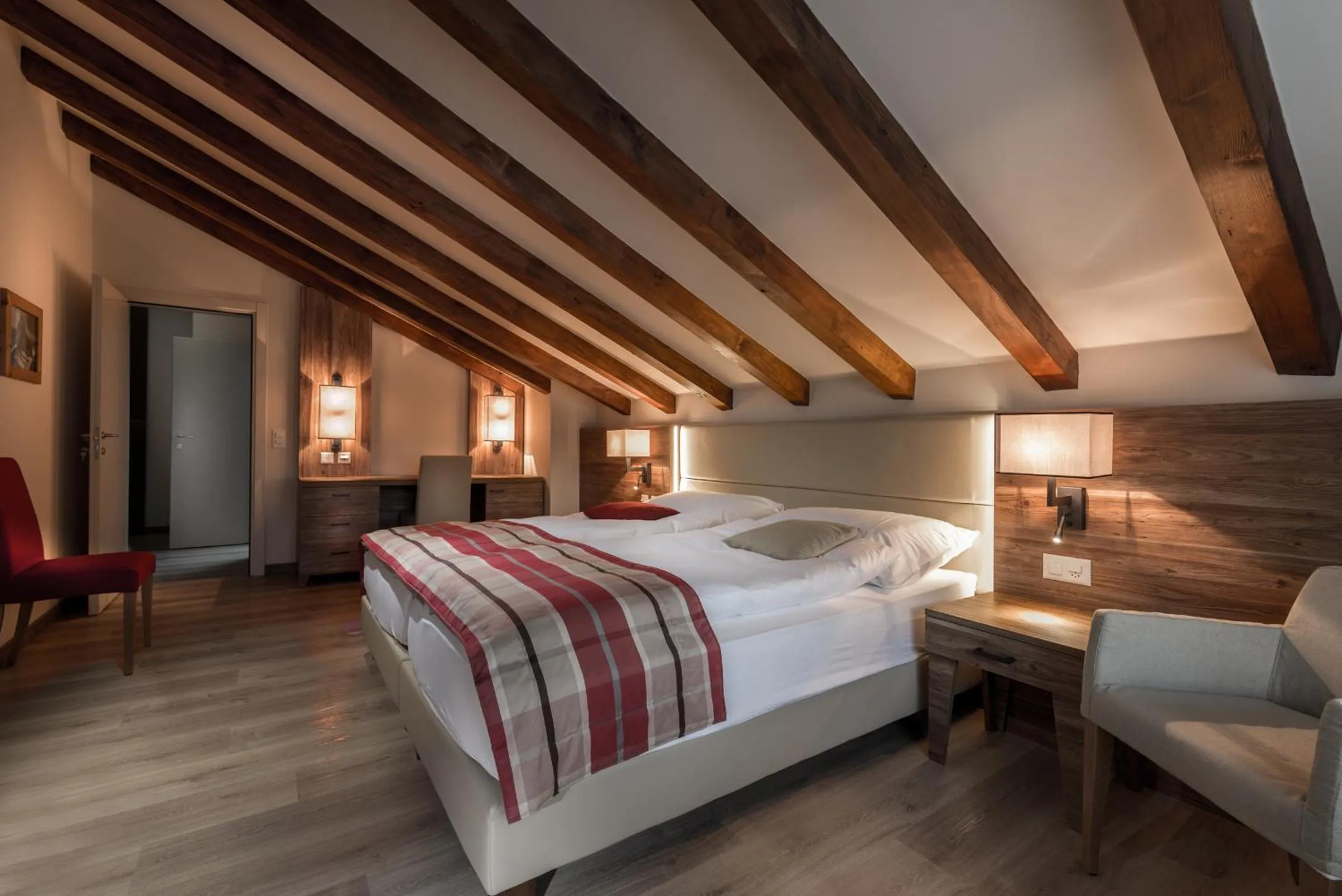 Bedroom, Bed in Hotel Ambassador Zermatt