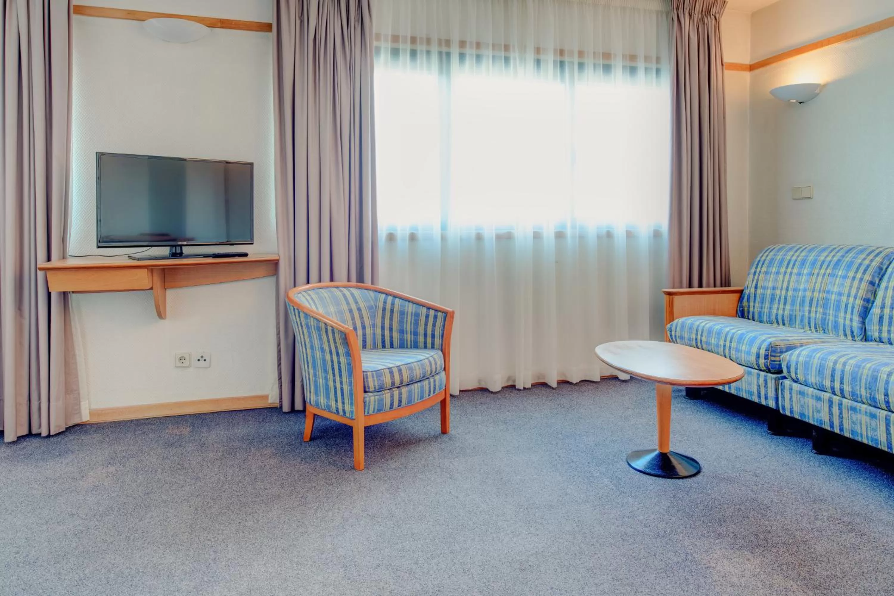 Living room in VIP Executive Eden Aparthotel