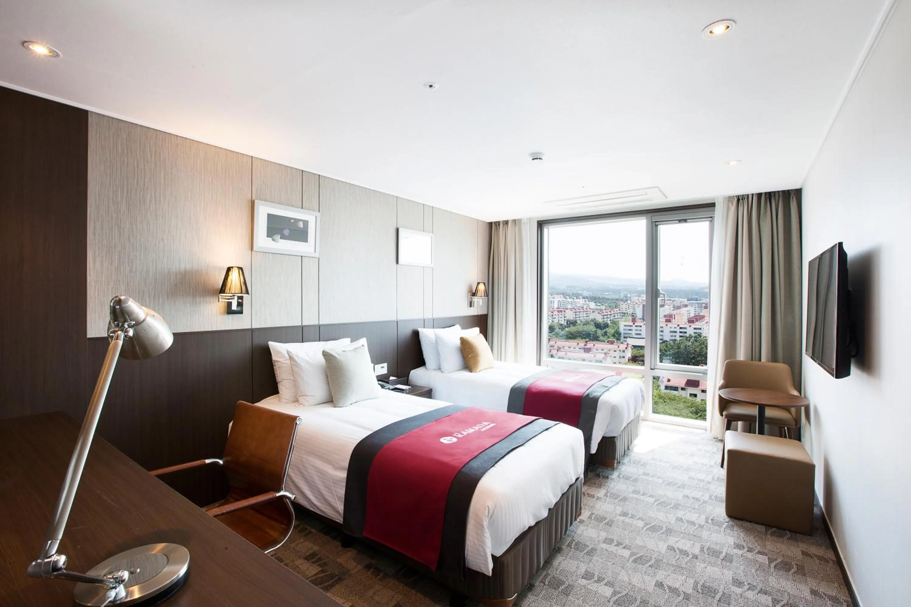 Bed in Ramada by Wyndham Jeju City Hall