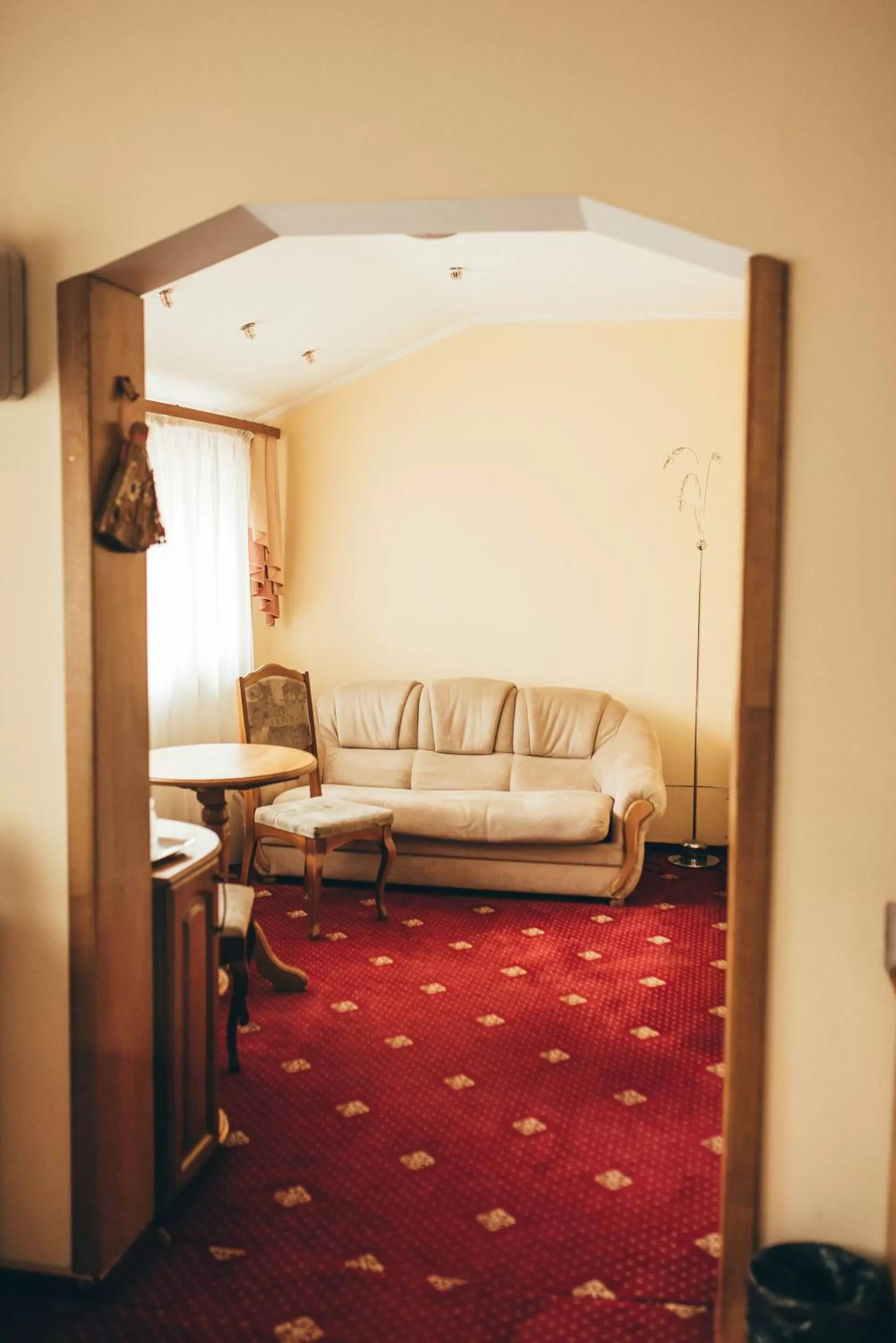 Bed, Seating Area in Lyube