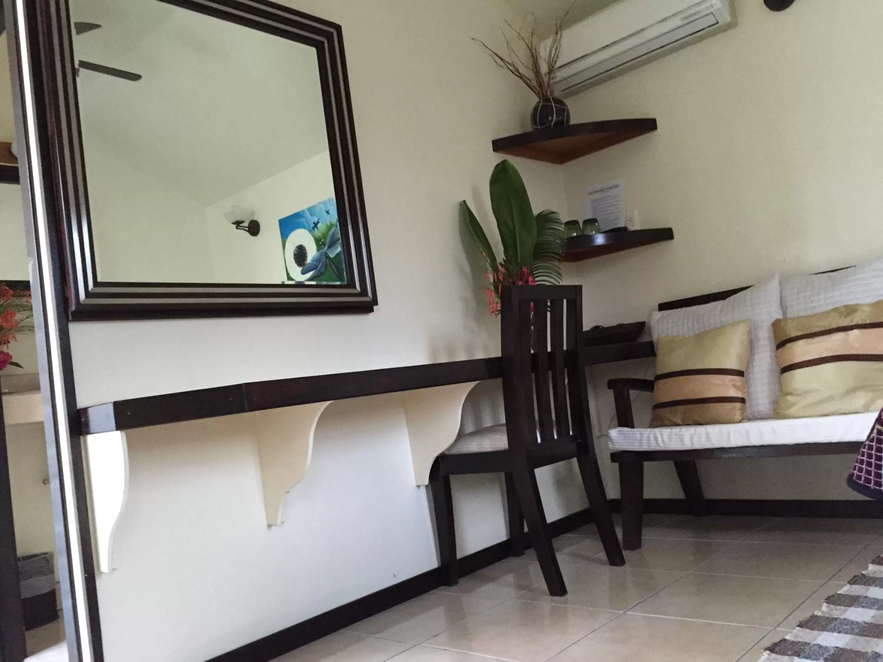 Bedroom, Seating Area in Blue Wave Guest House