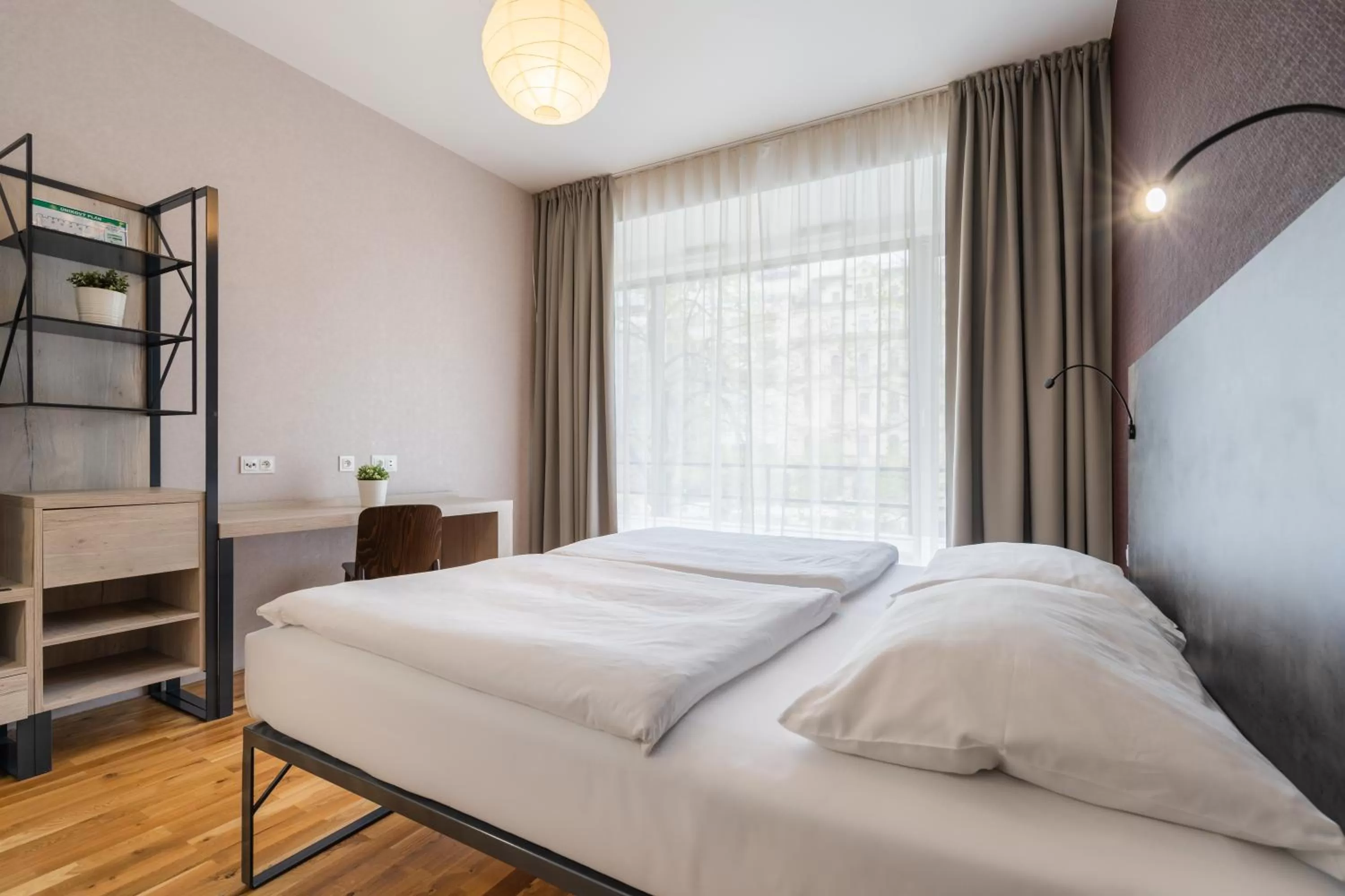 Bed in EA ApartHotel Melantrich