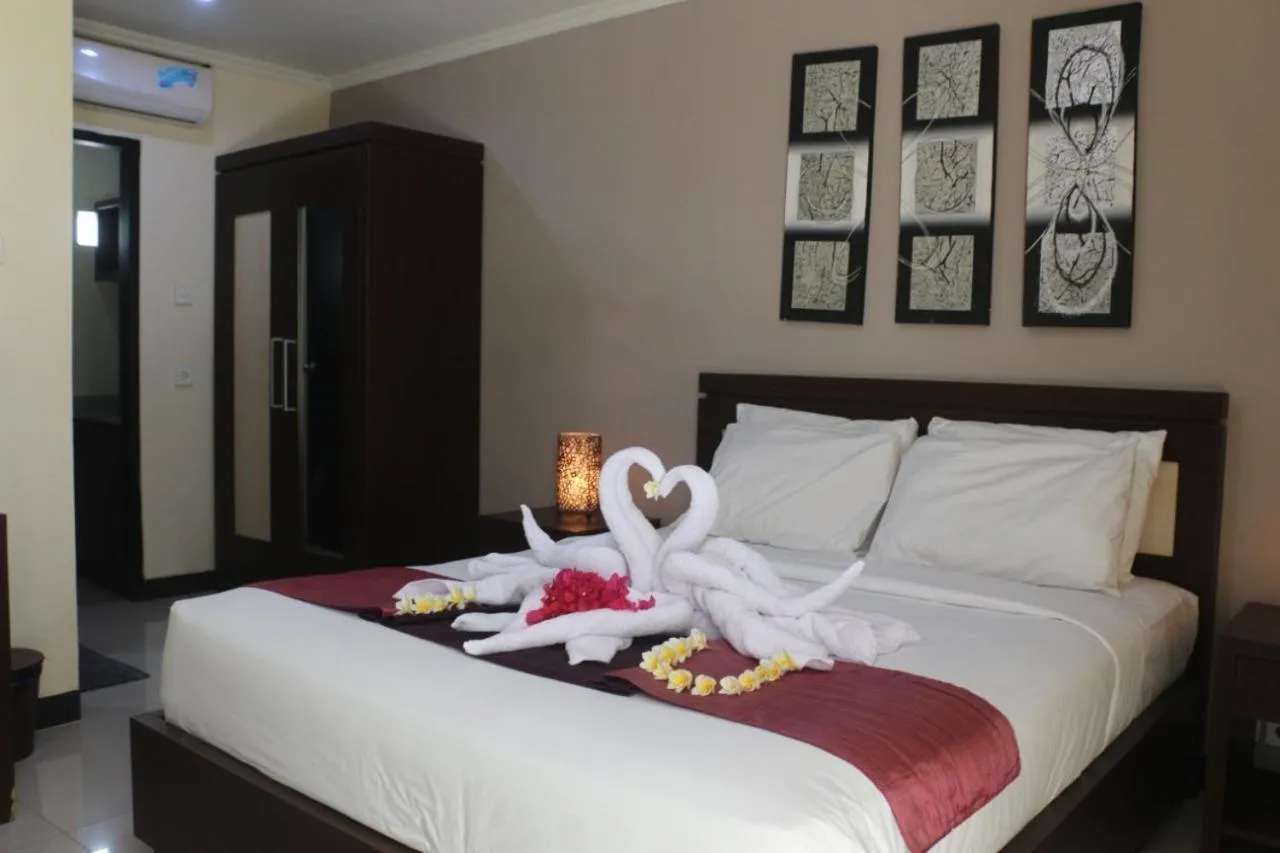 Bed in Mansu Hotel and Spa Legian