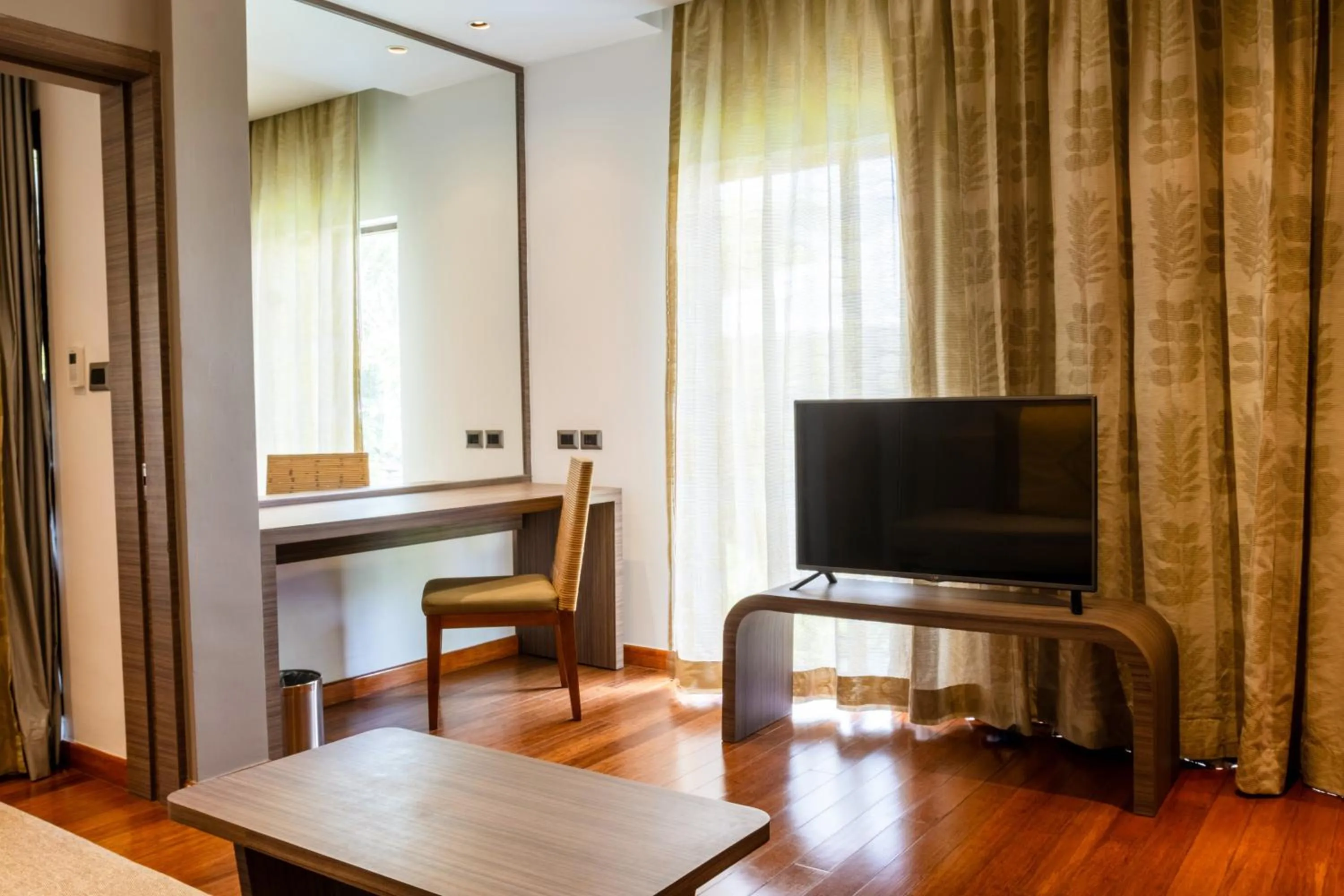 Photo of the whole room, TV/Entertainment Center in Destination Resorts Phuket Karon Beach - SHA Extra Plus