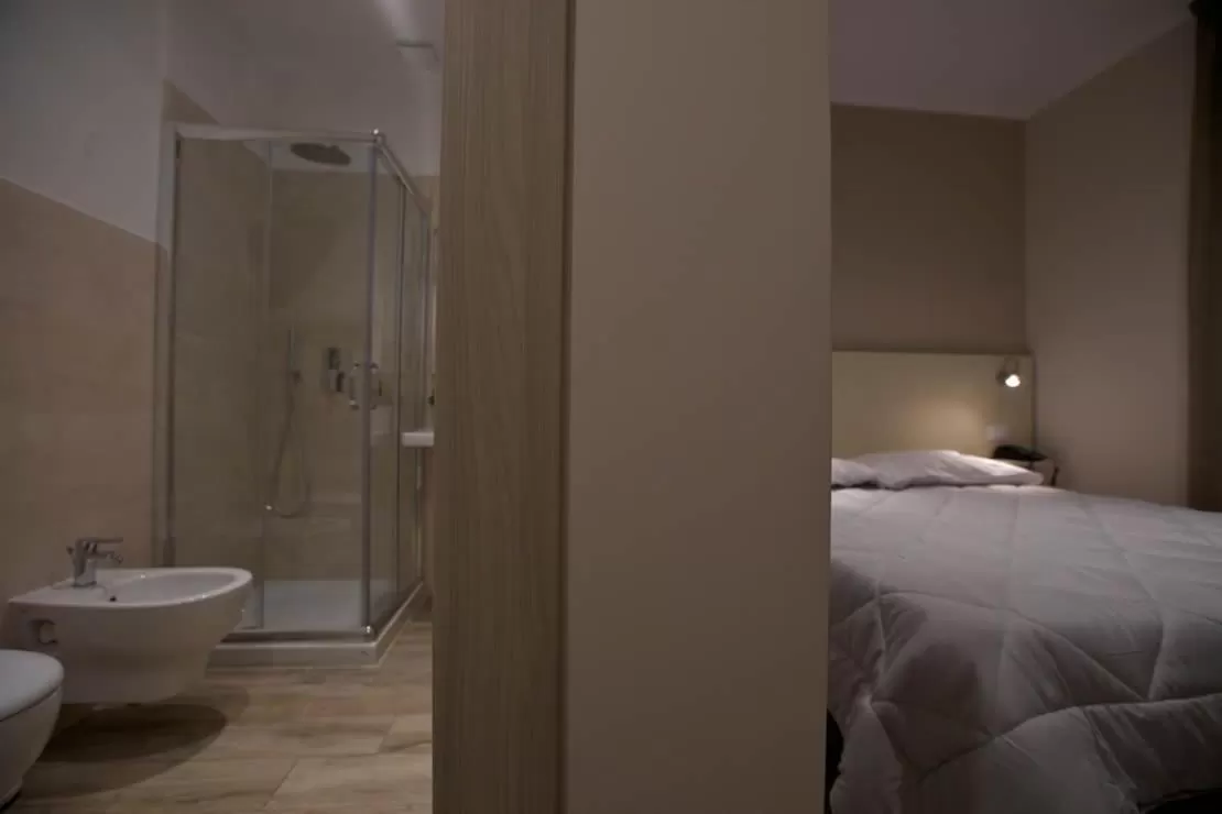 Bed in Onorati Hotel