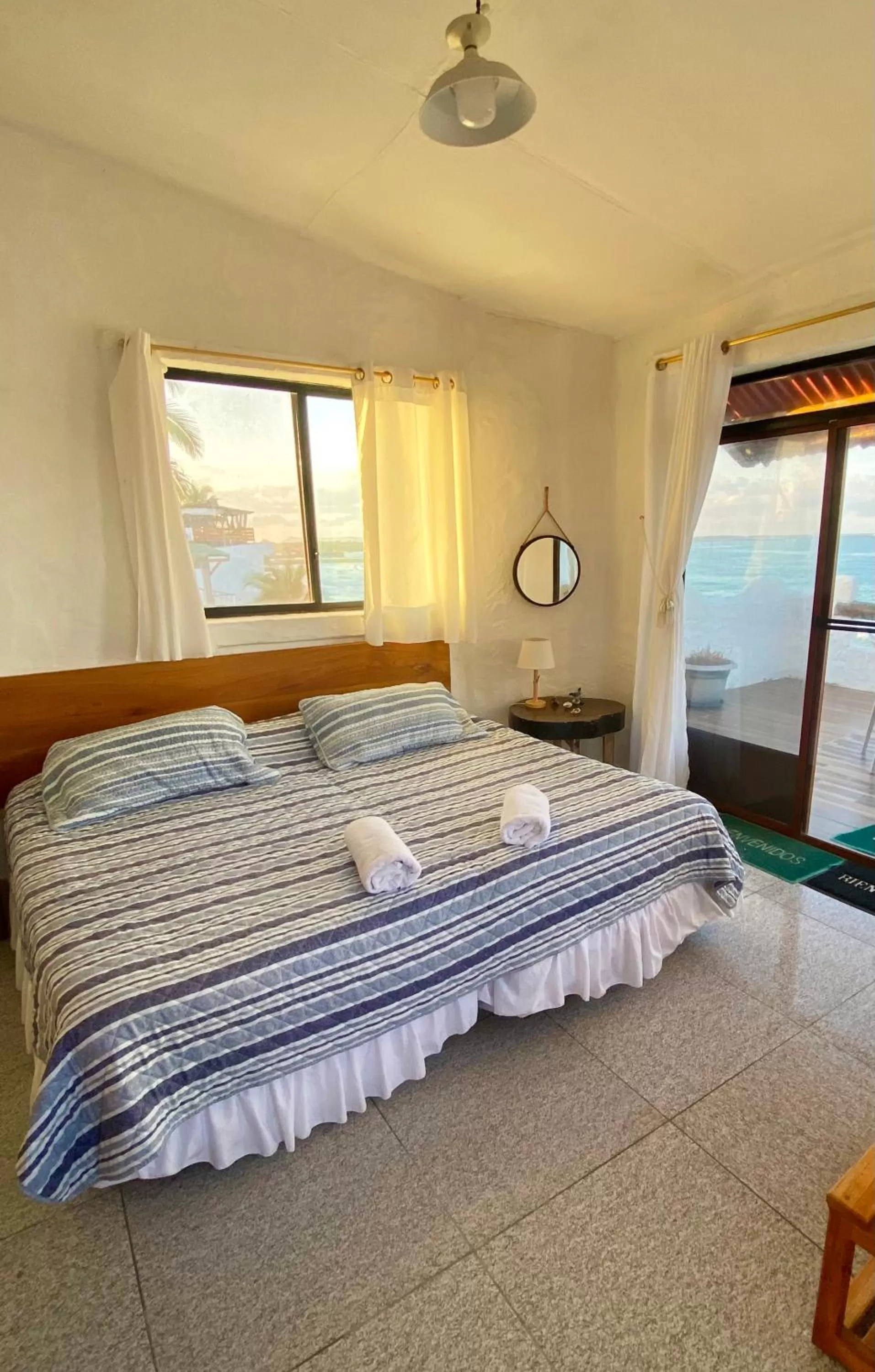 Bed in Hostal Galapagos by Bar de Beto