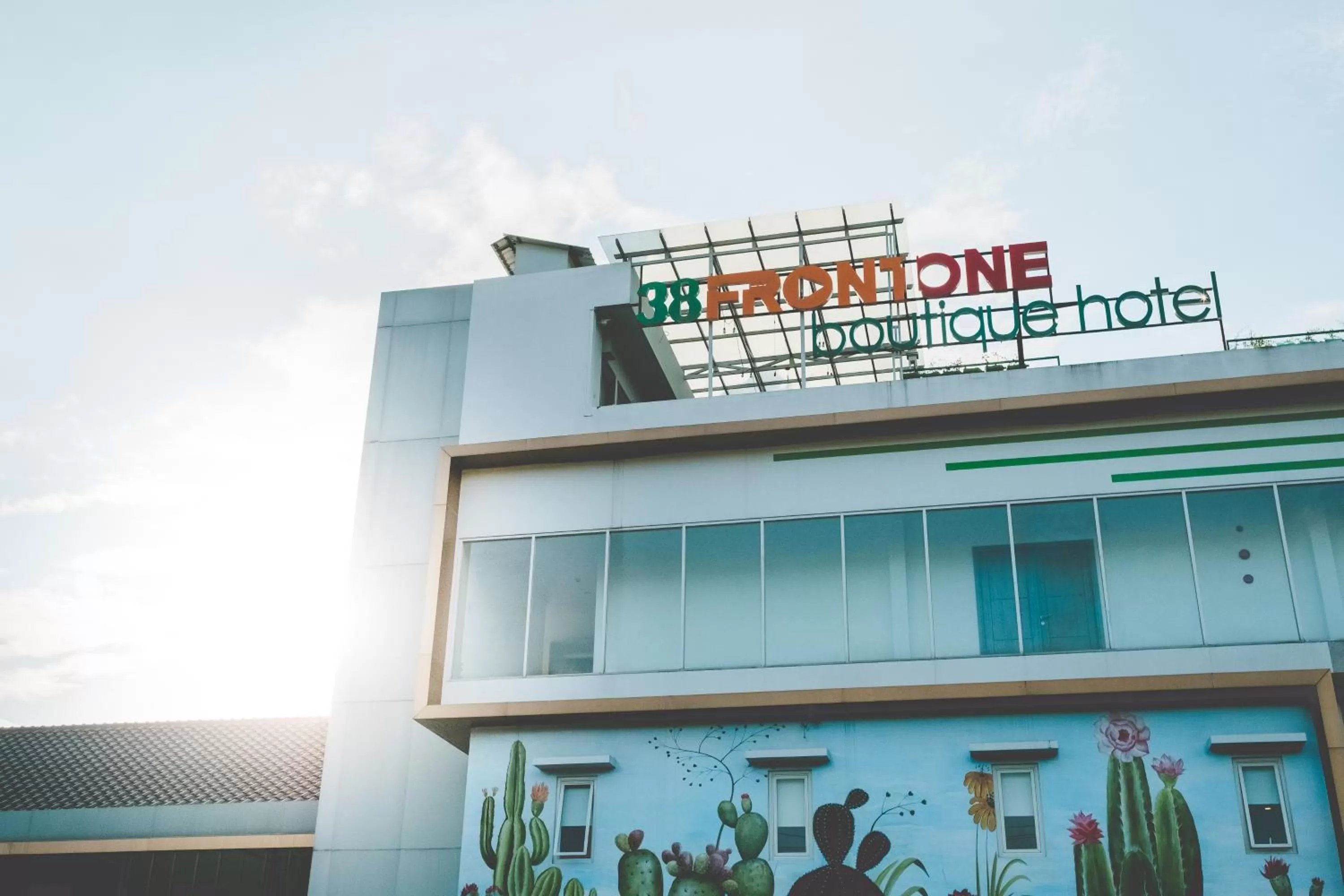 Property logo or sign in Three Eight Front One Boutique Batu Malang