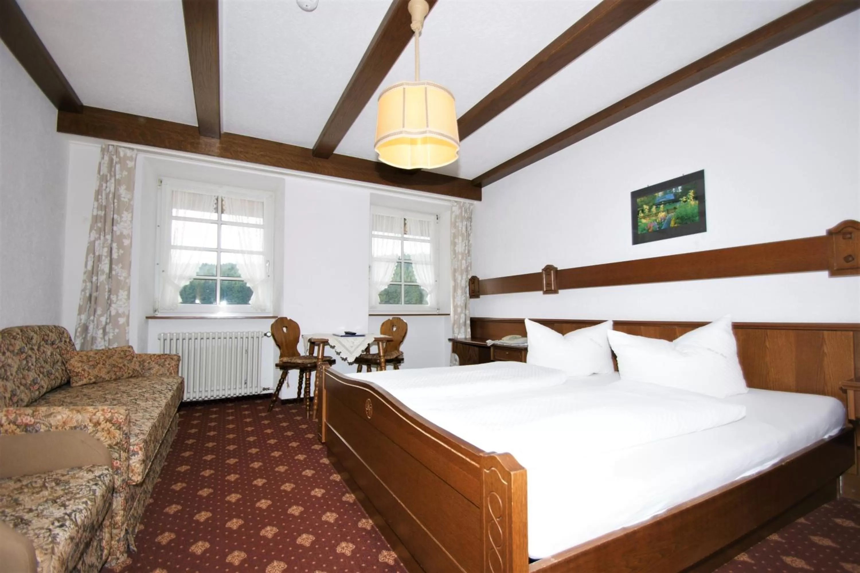 Photo of the whole room, Bed in ZUR TRAUBE Schwarzwaldhotel & Restaurant am Titisee