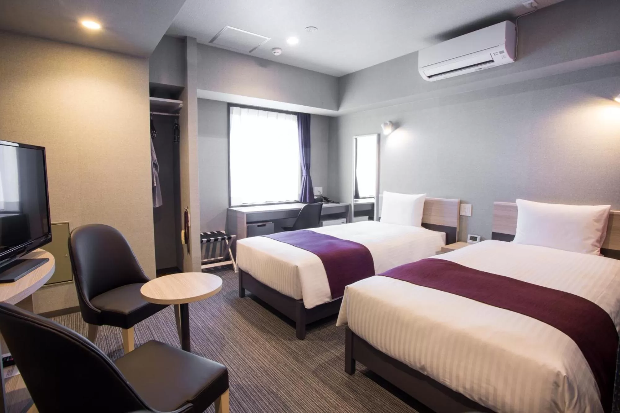 Bed in Kuretake Inn Nagoya Hisayaodori