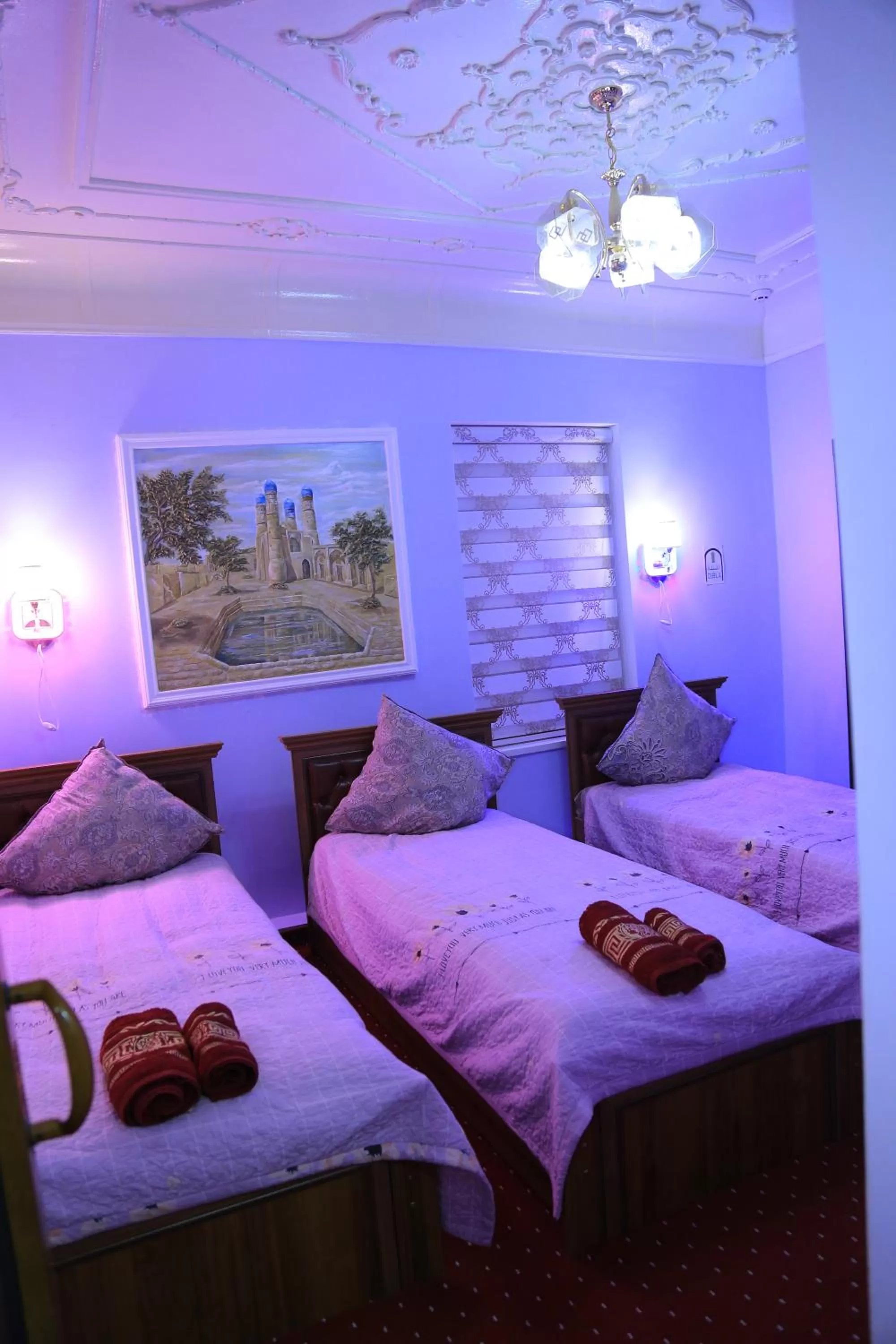 Decorative detail, Bed in Alliance hotel bukhara