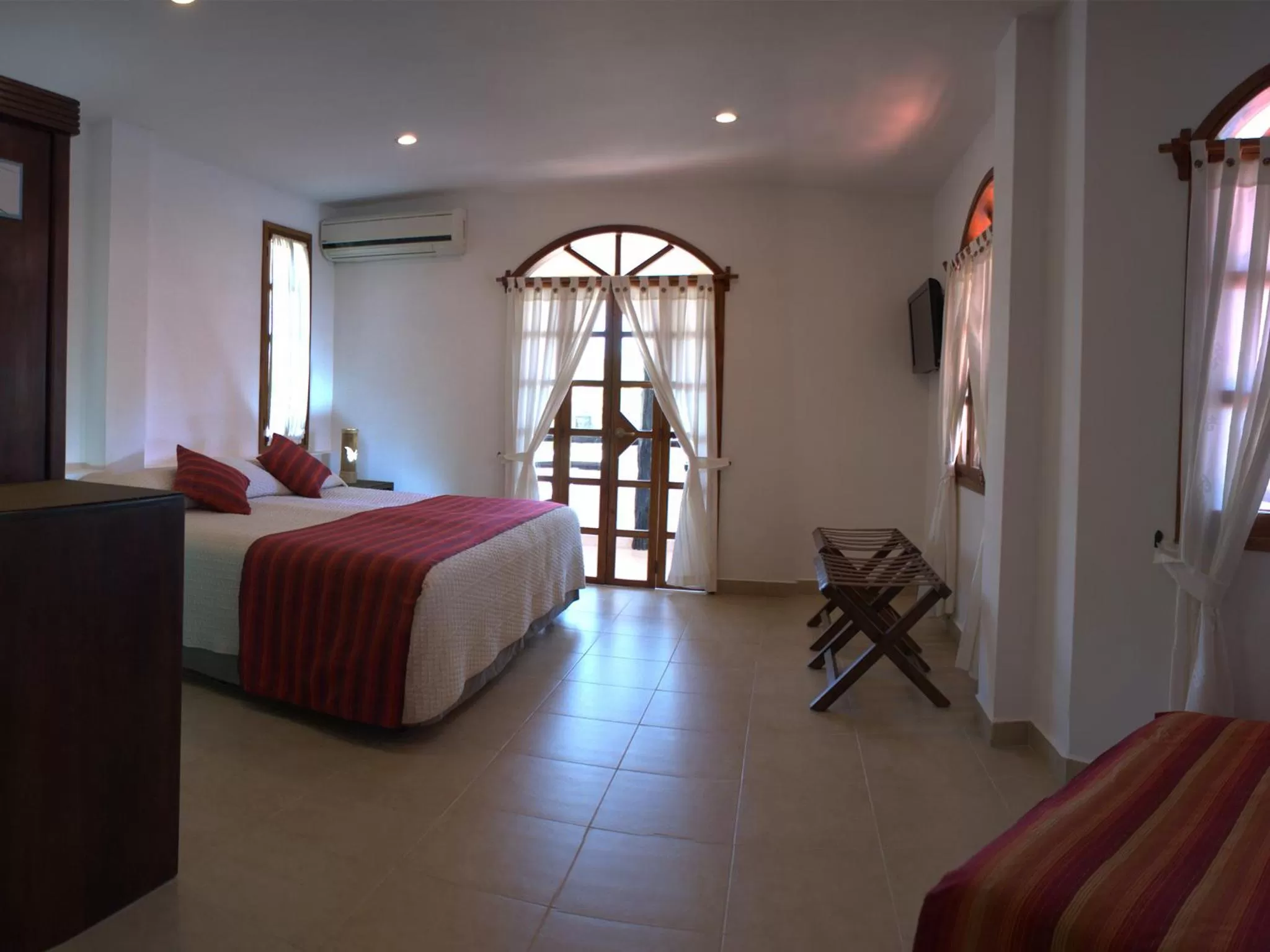 Bedroom, Bed in Hotel Galapagos Suites B&B