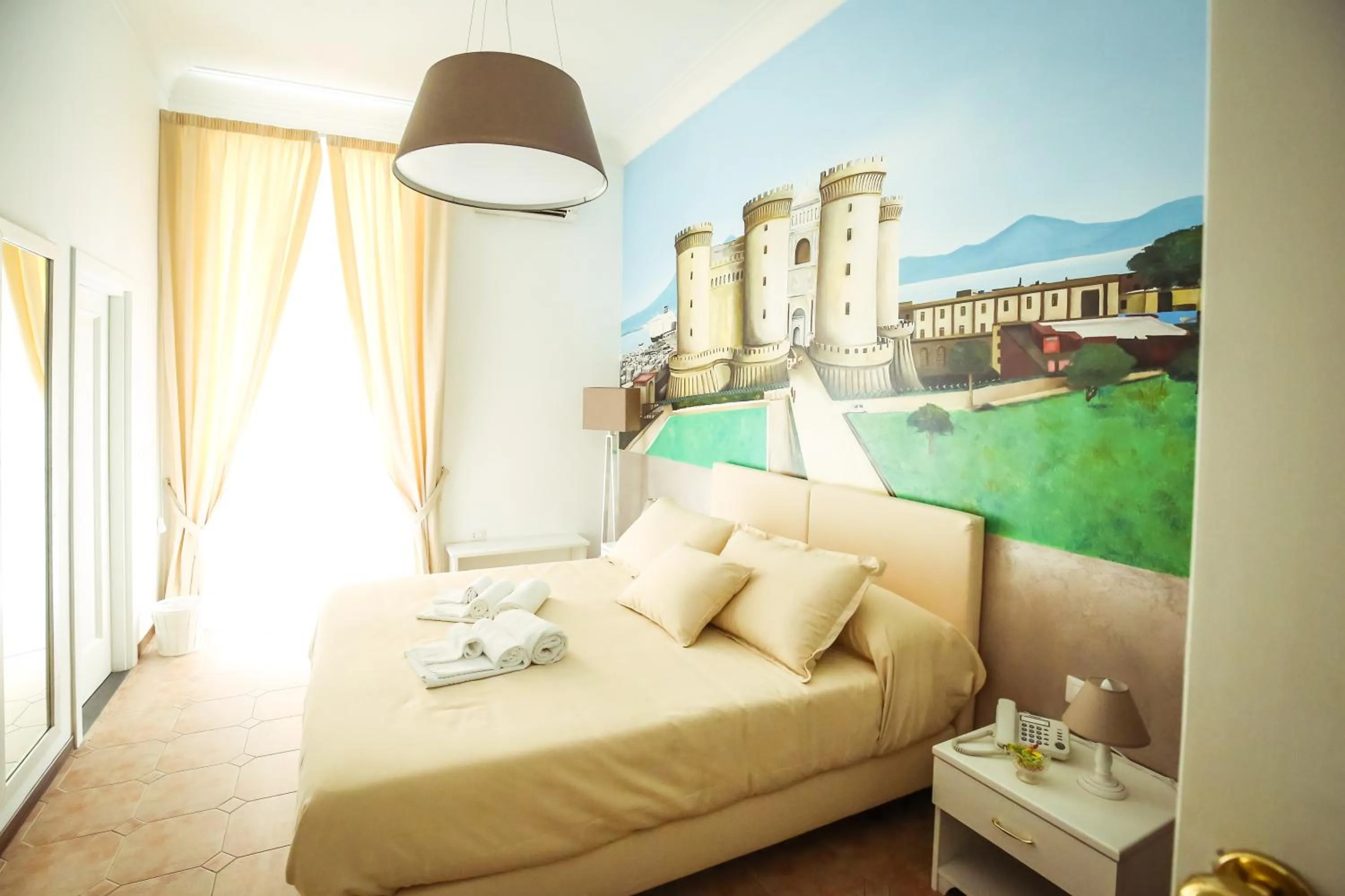 Bed in NapoliMia Boutique Hotel