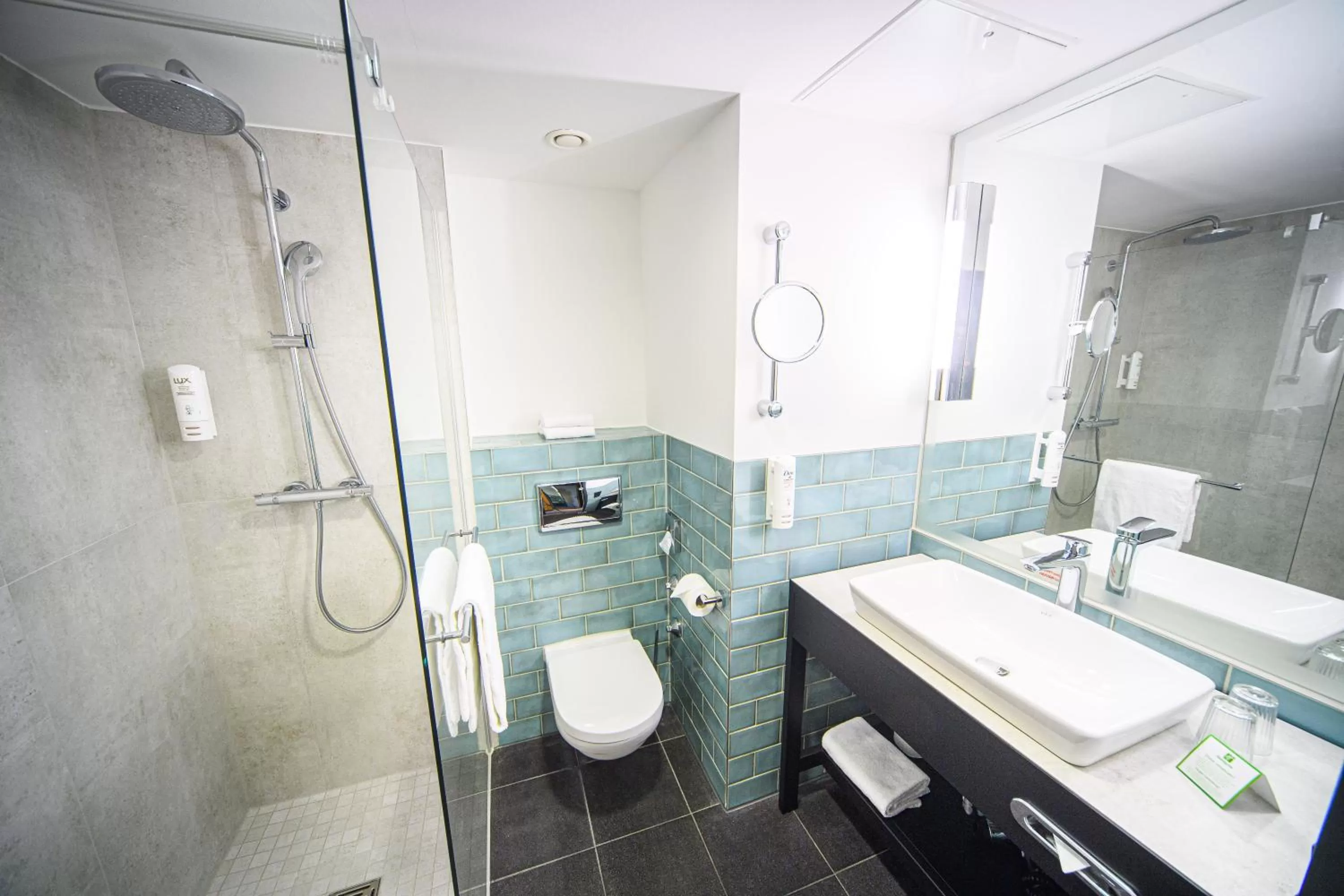 Bathroom in Holiday Inn Lübeck by IHG
