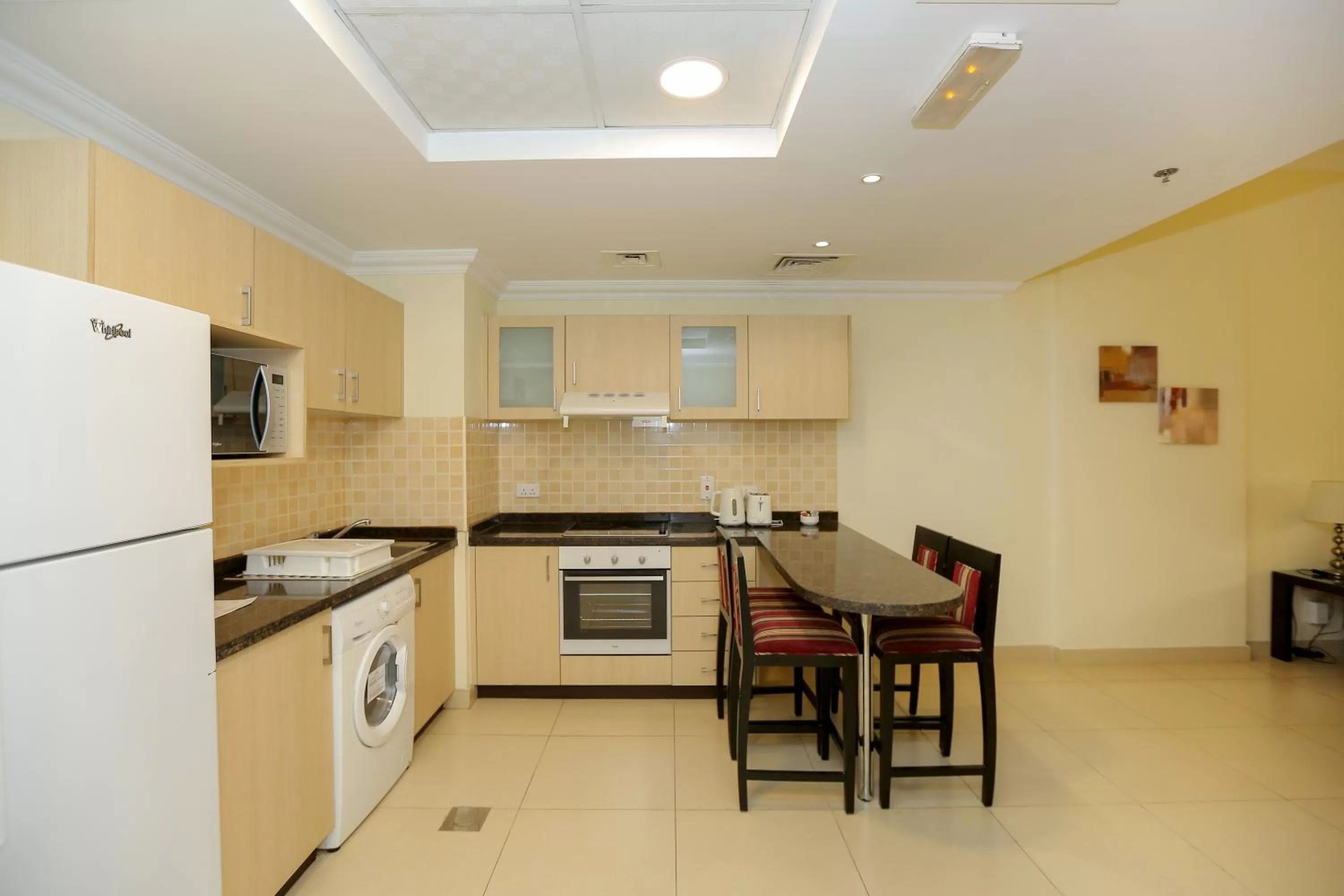 Kitchen or kitchenette in Ivory Grand Hotel Apartments