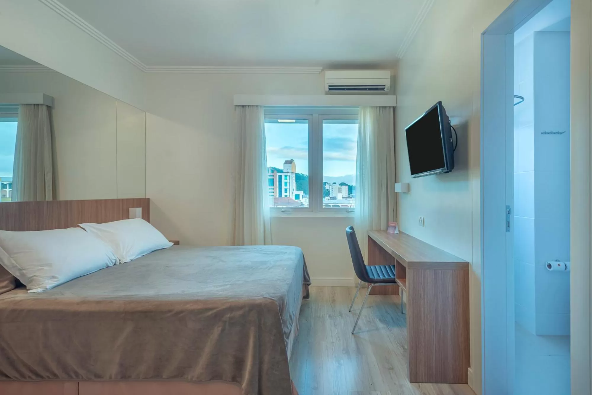 Bed in Hotel Glória