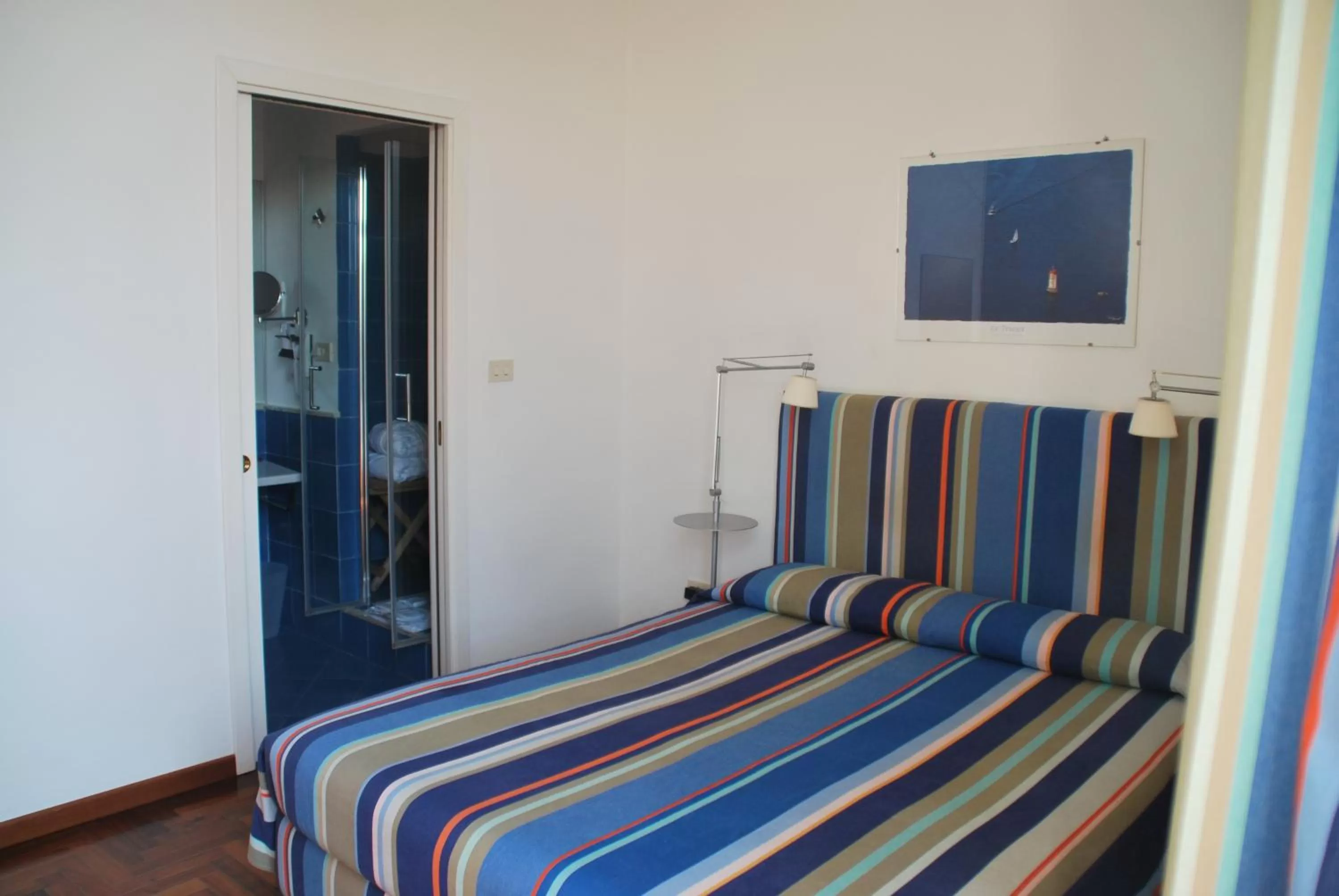 Photo of the whole room, Bed in L'Approdo delle Sirene