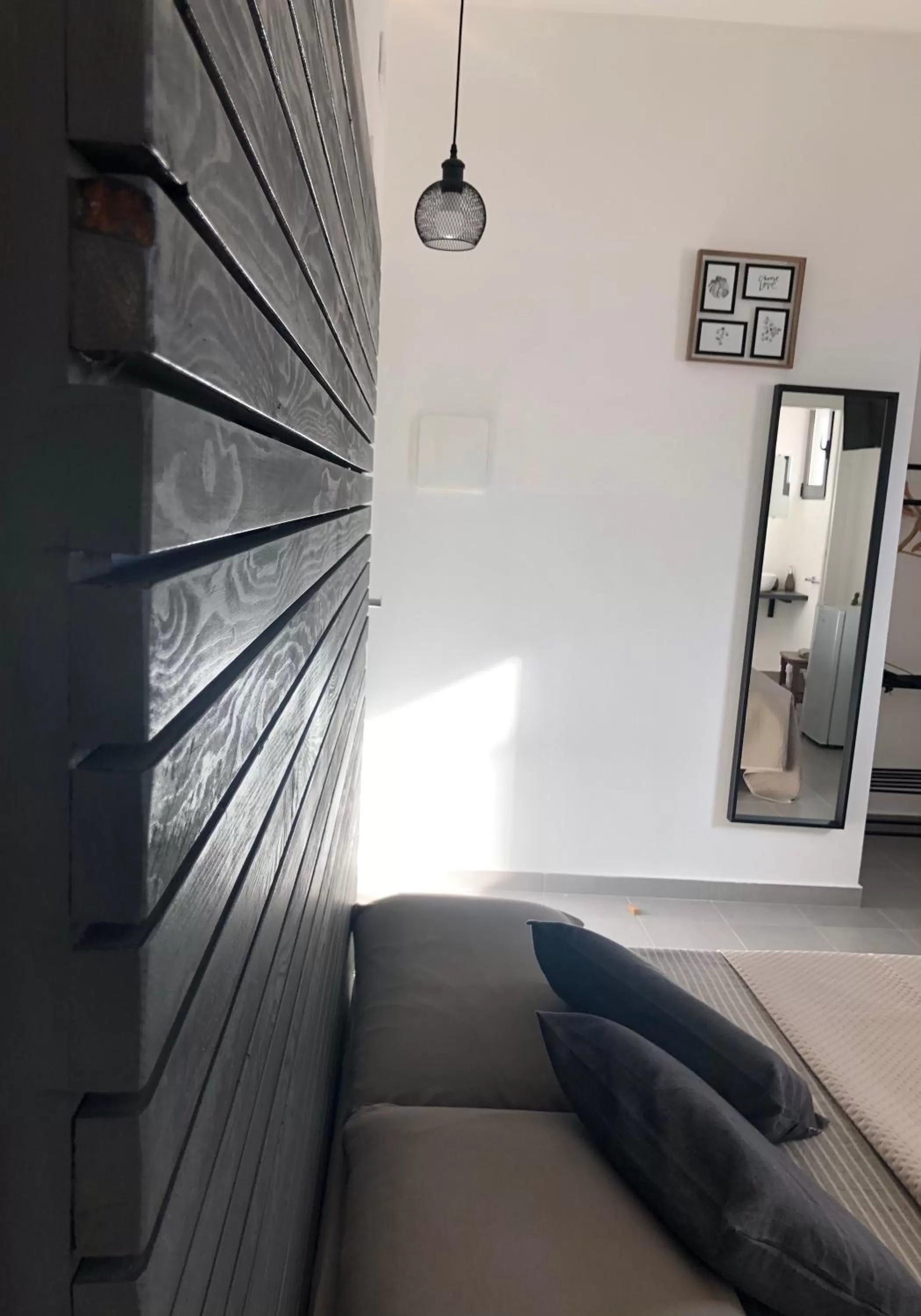 Living room, Bed in B&B BELLAMI'