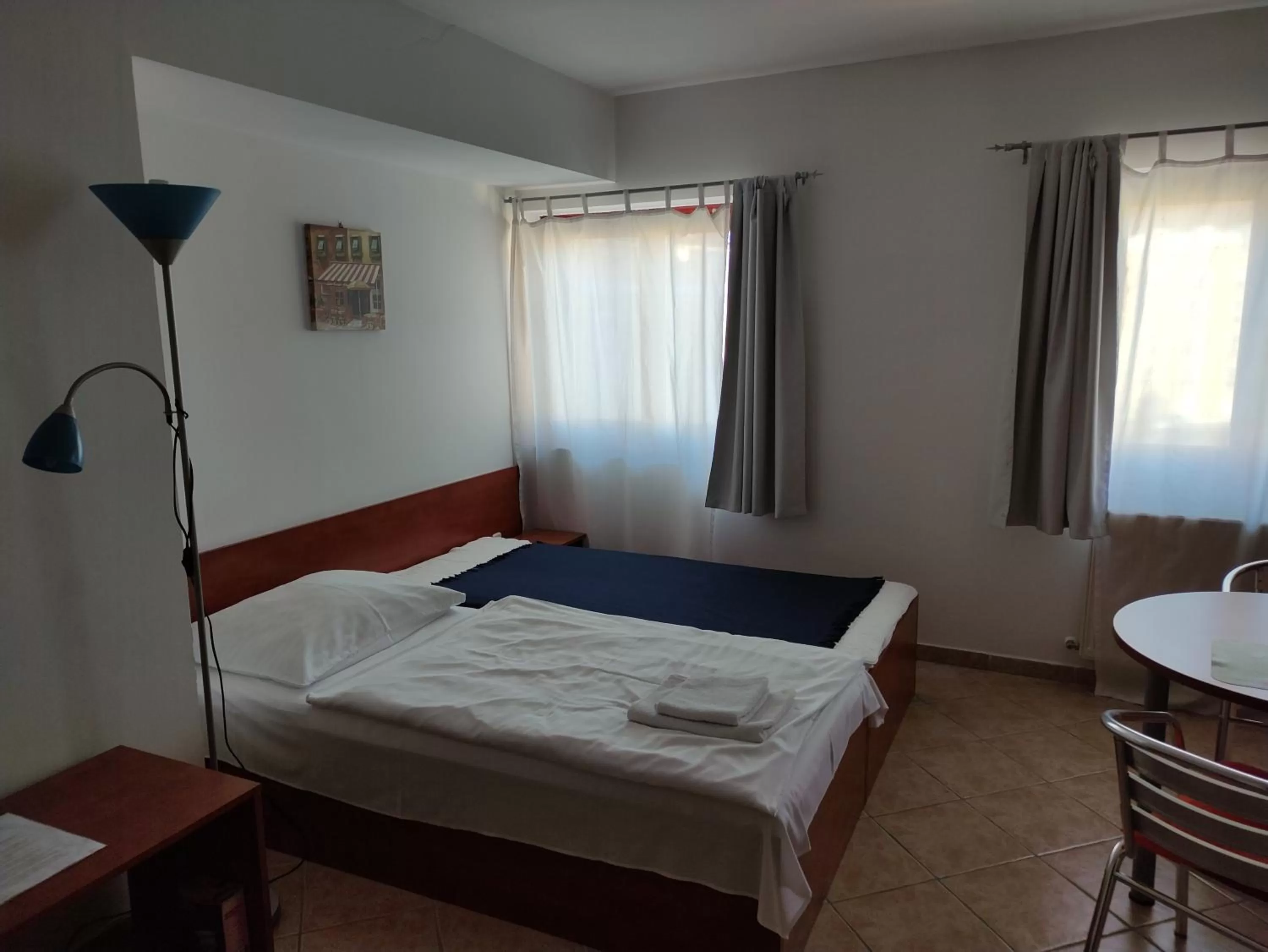 Bed in Szent Kristóf Apartmanhotel