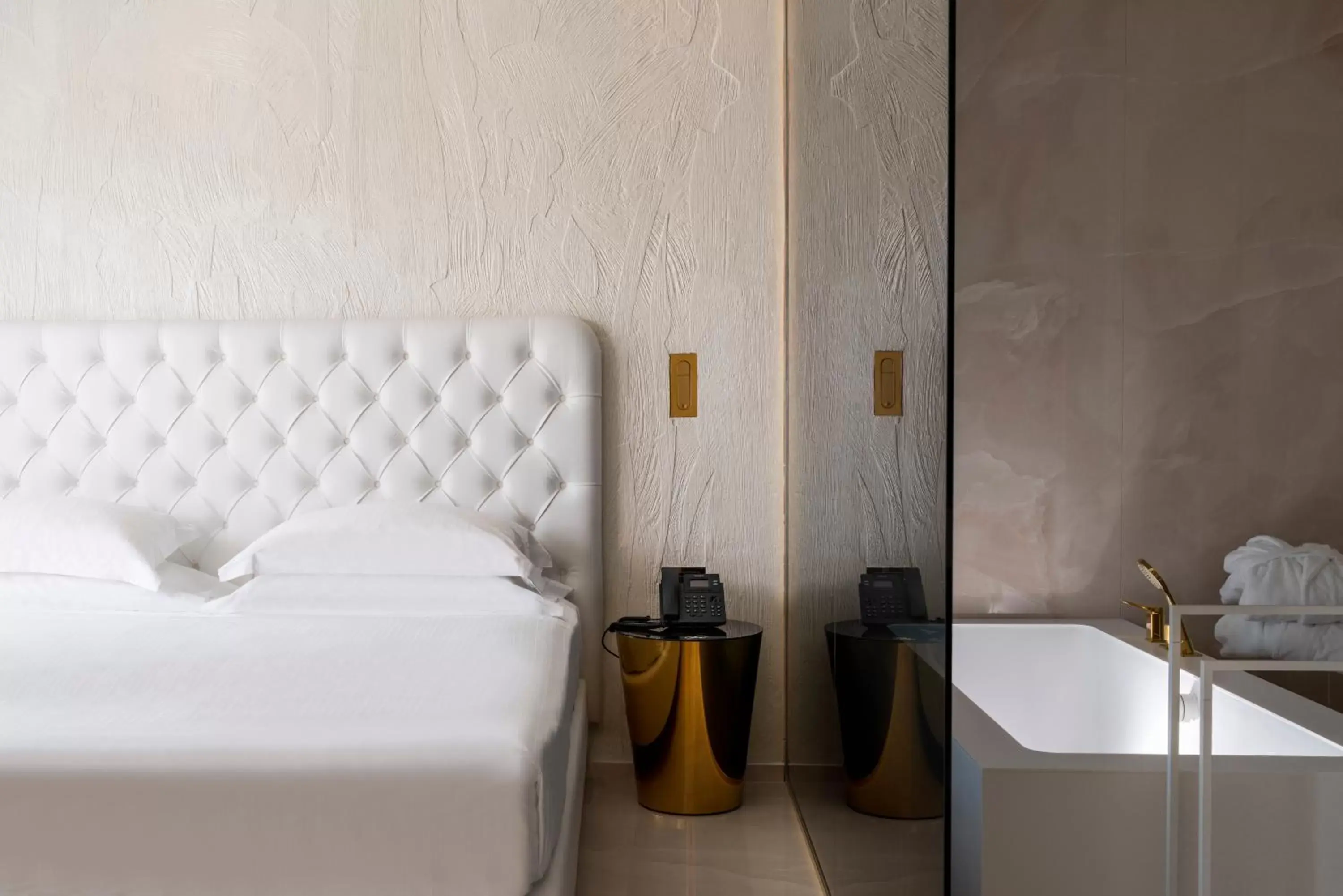 Junior Suite with balcony and side sea view in The Promenade Luxury Wellness Hotel Junior Suite with balcony and side sea view in The Promenade Luxury Wellness Hotel