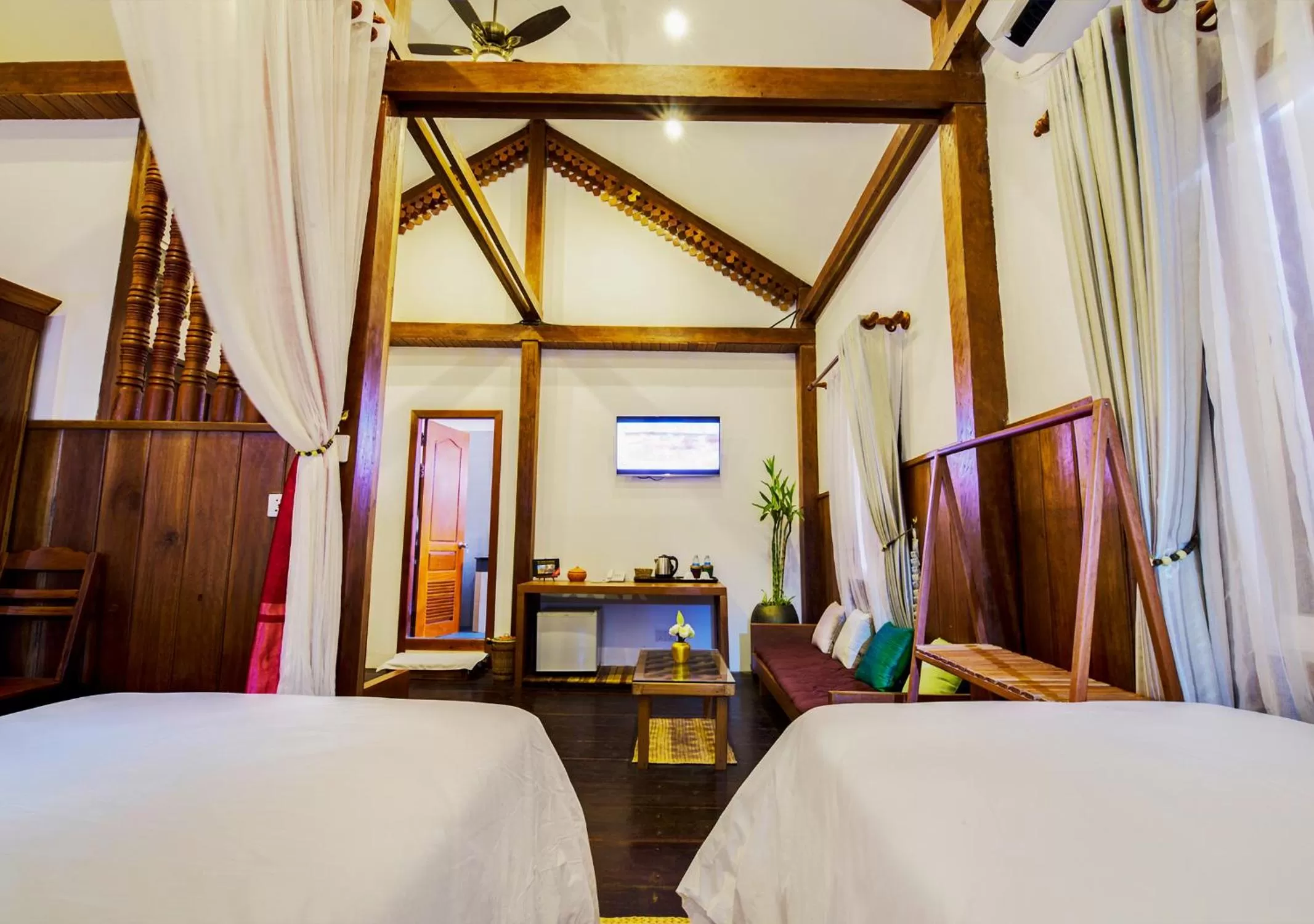 Bed in Maison Model d'Angkor