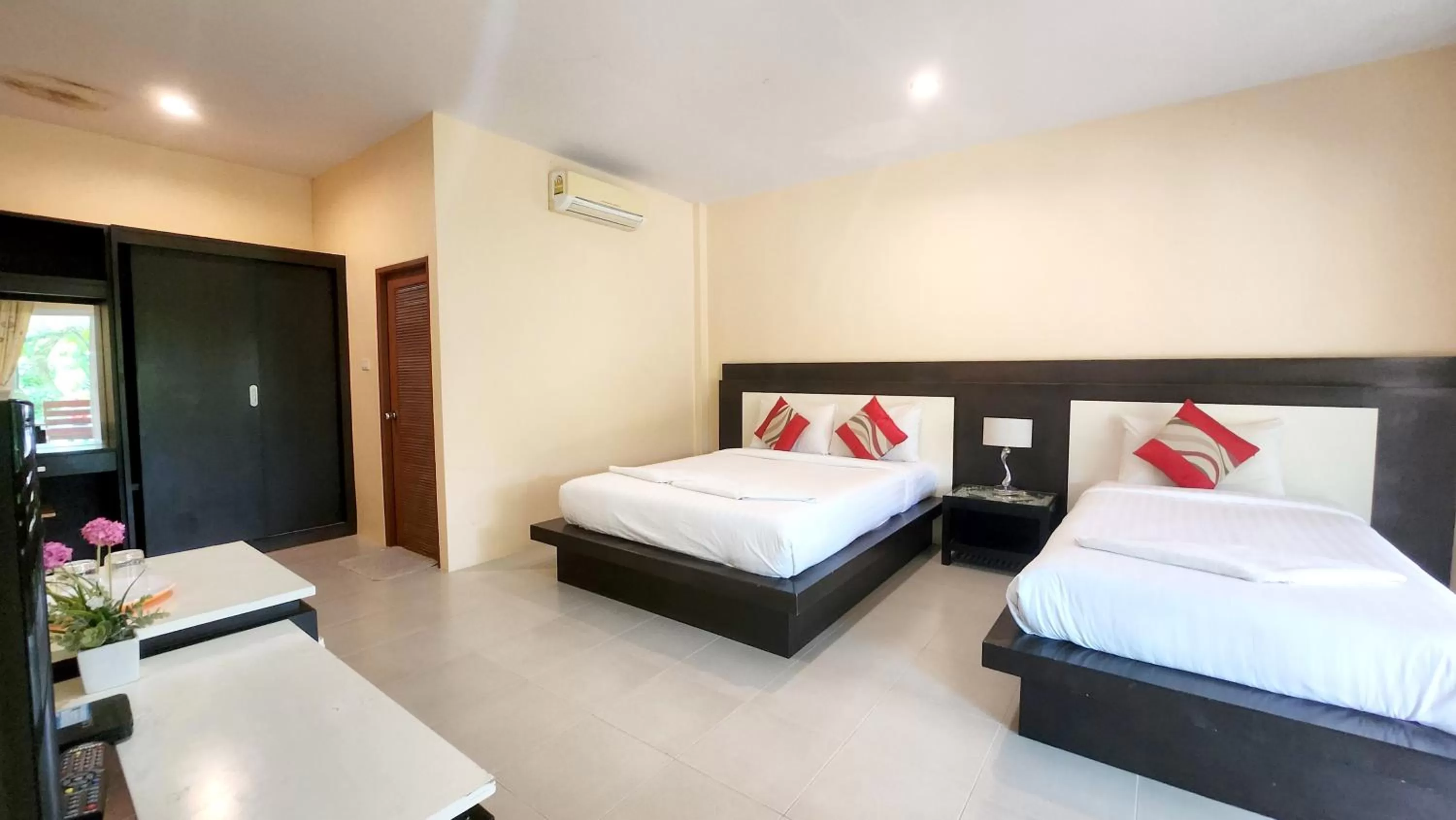 Bed in Sawaddee Aonang Resort