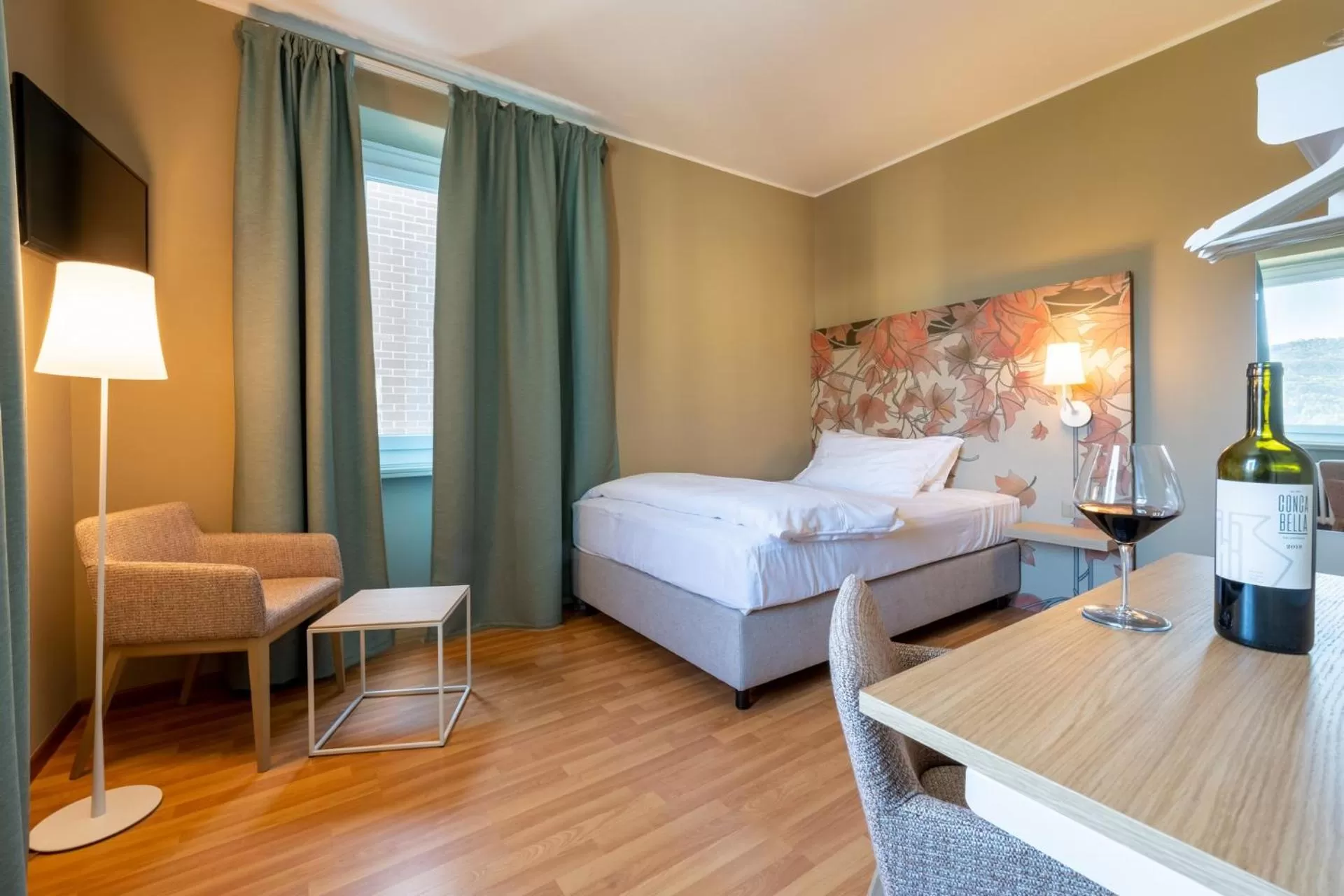 Bed in Conca Bella Boutique Hotel & Wine Experience