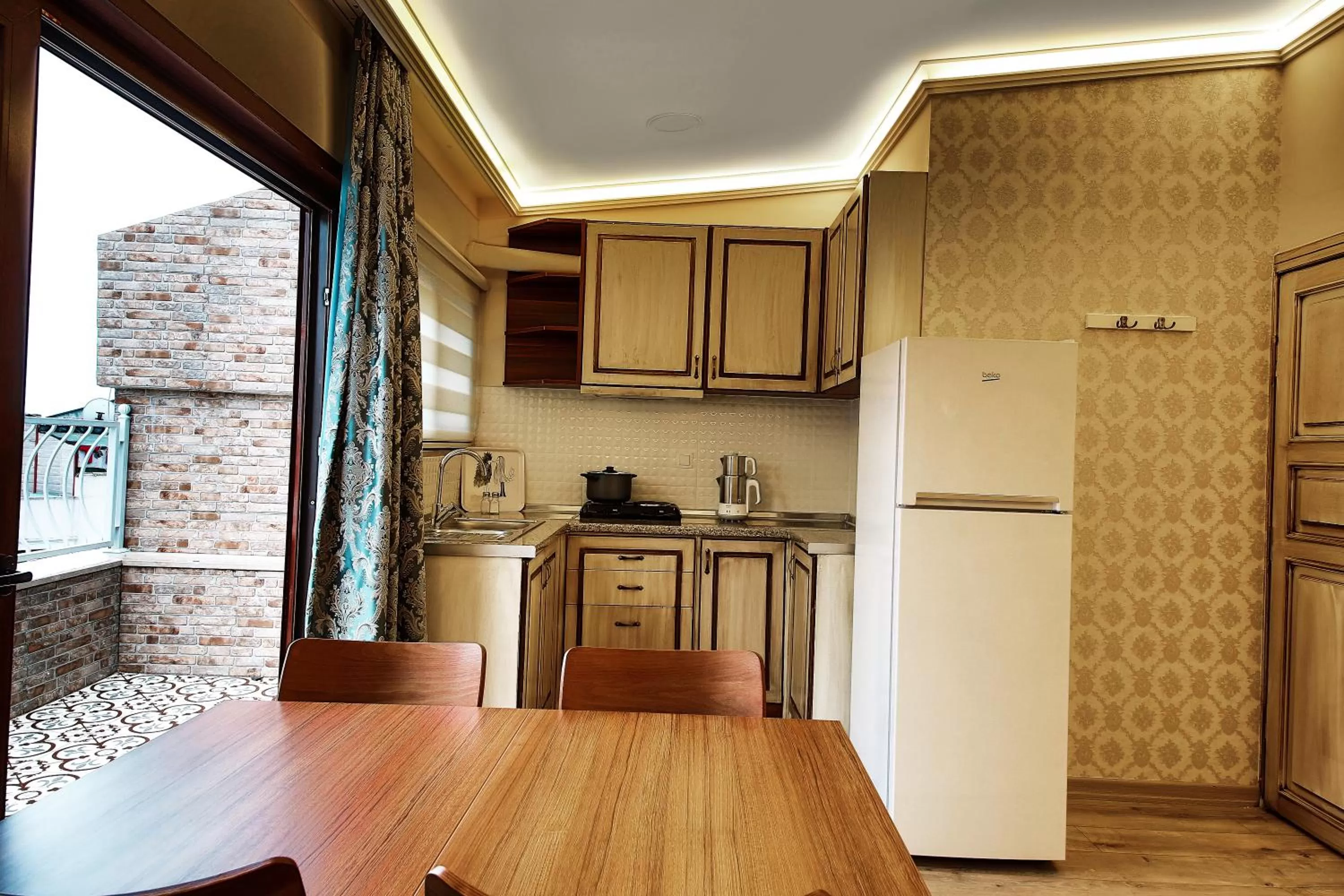 Kitchen or kitchenette in Katelya Hotel