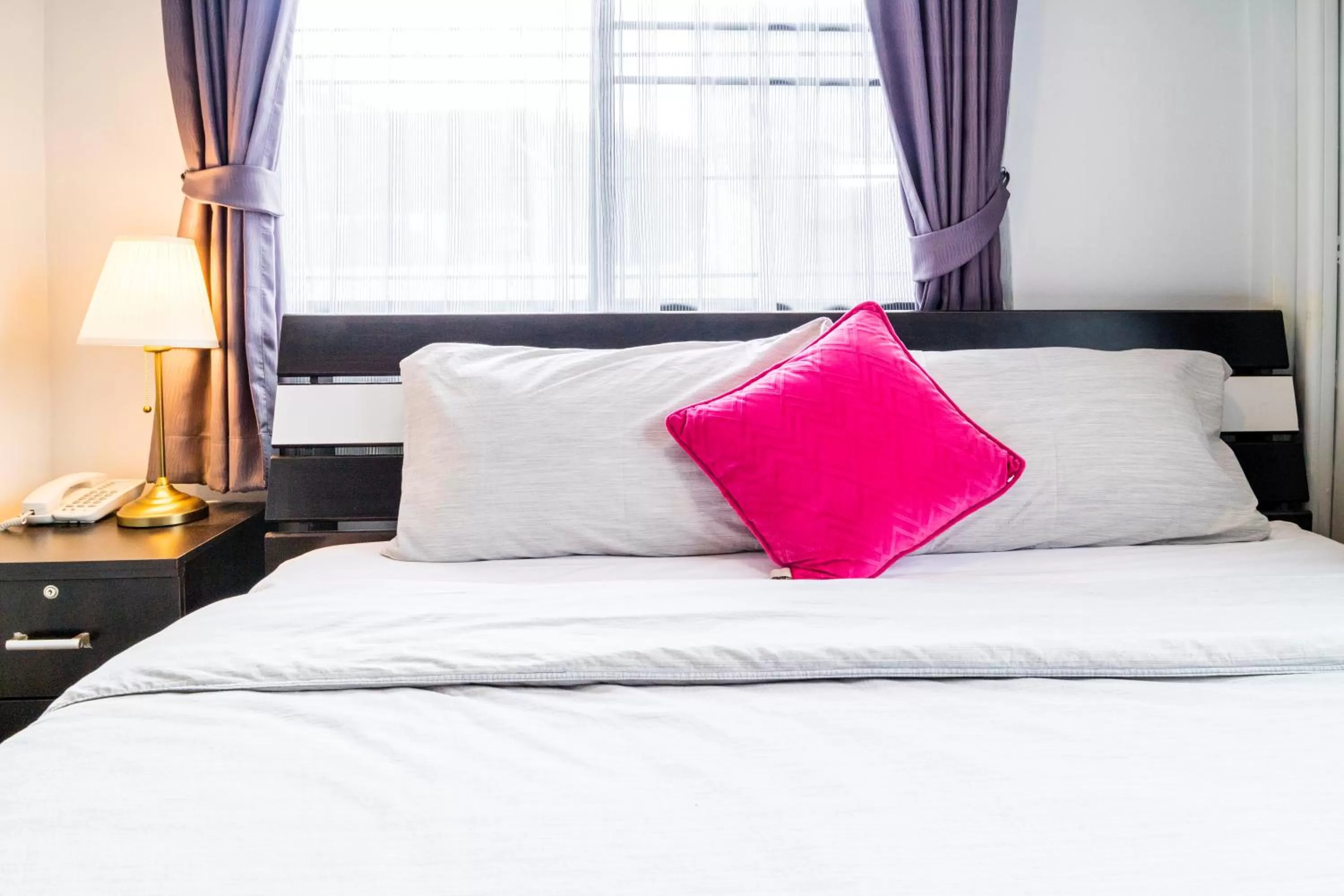 Bed in The Cube Sathorn Boutique Hotel