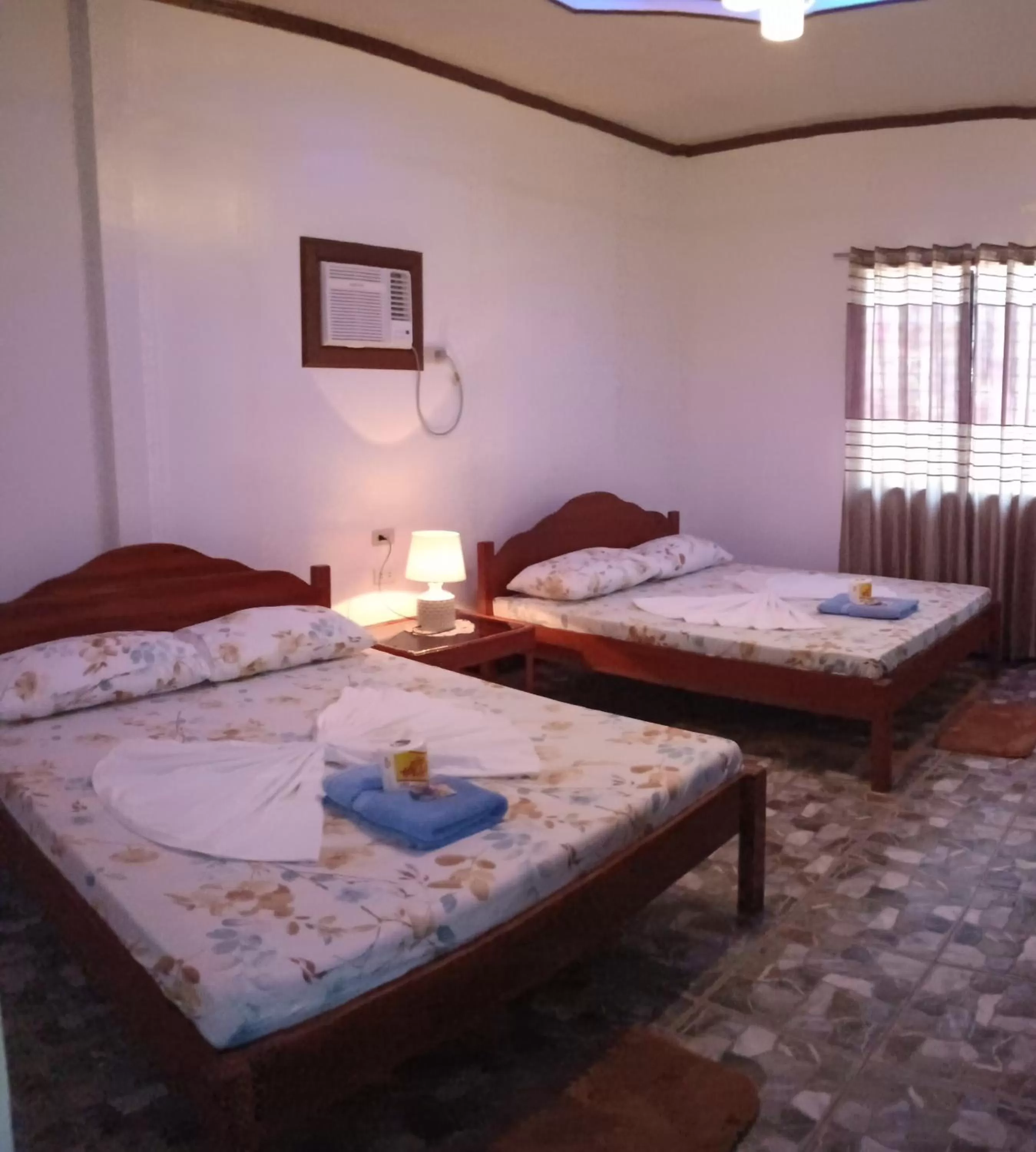 Bed in E&N Paradise Island Resort