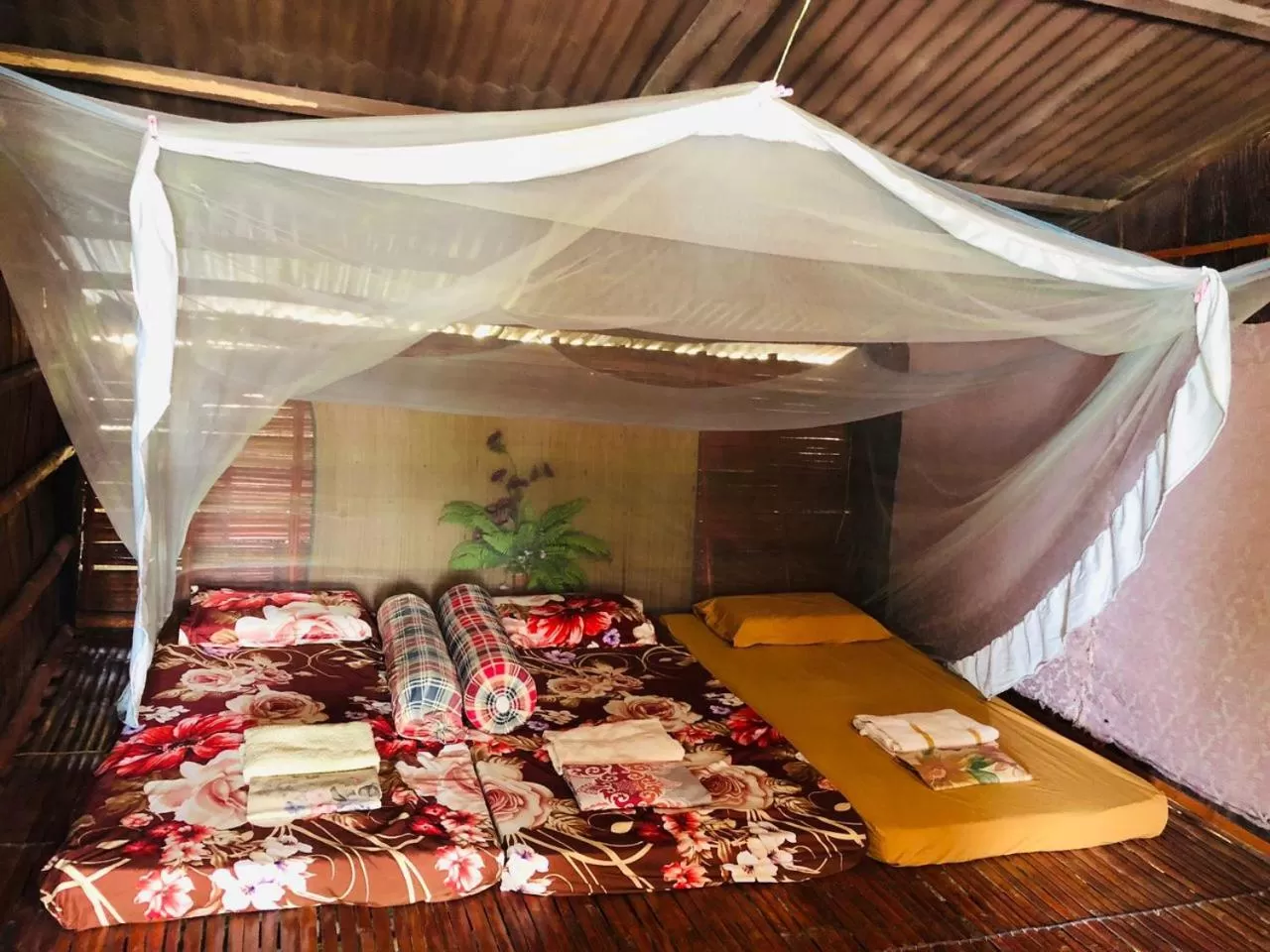 Bed in Dragon Pearl Beach Resort